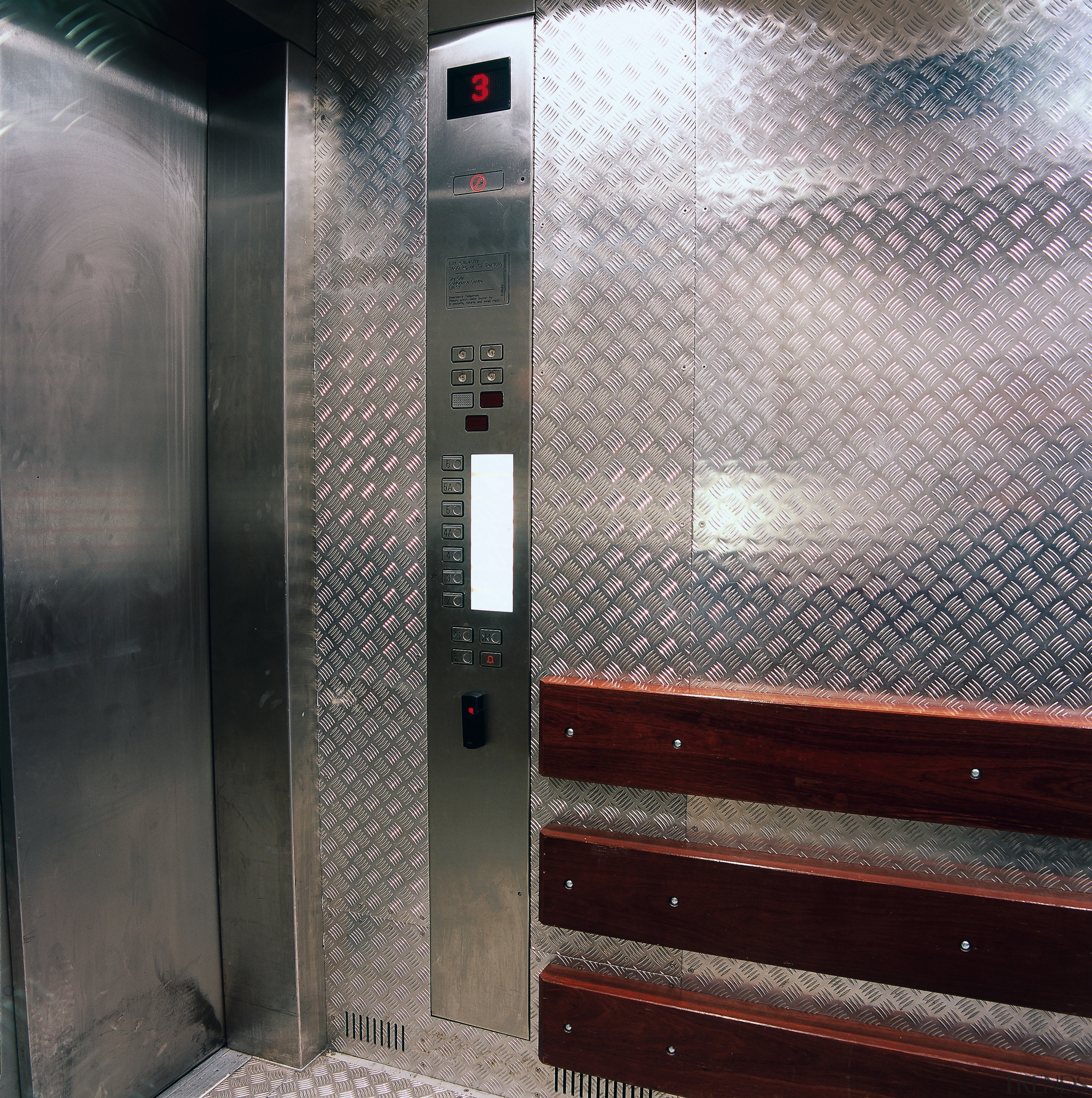 Service lift with heavy gauge aluminium chequer plate elevator, gray