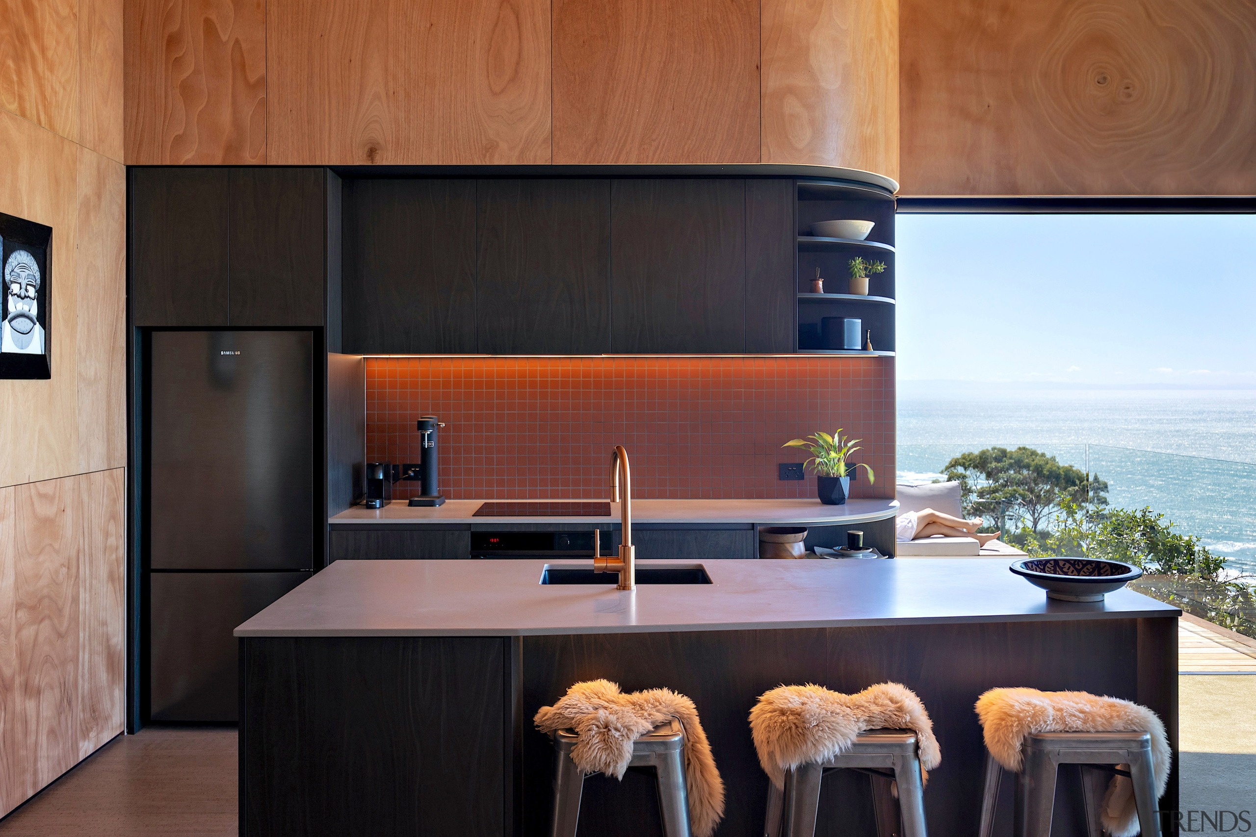 The black birch plywood joinery is paired with 