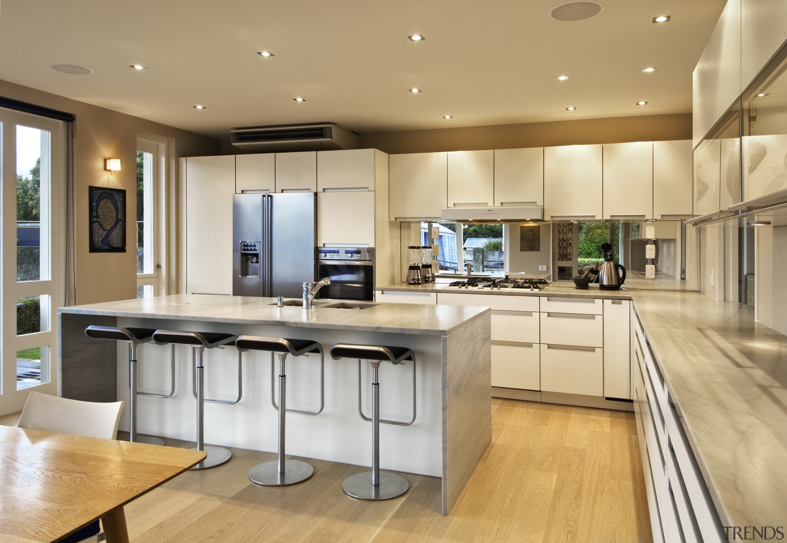 View of kitchen which has been designed by countertop, cuisine classique, interior design, kitchen, real estate, orange