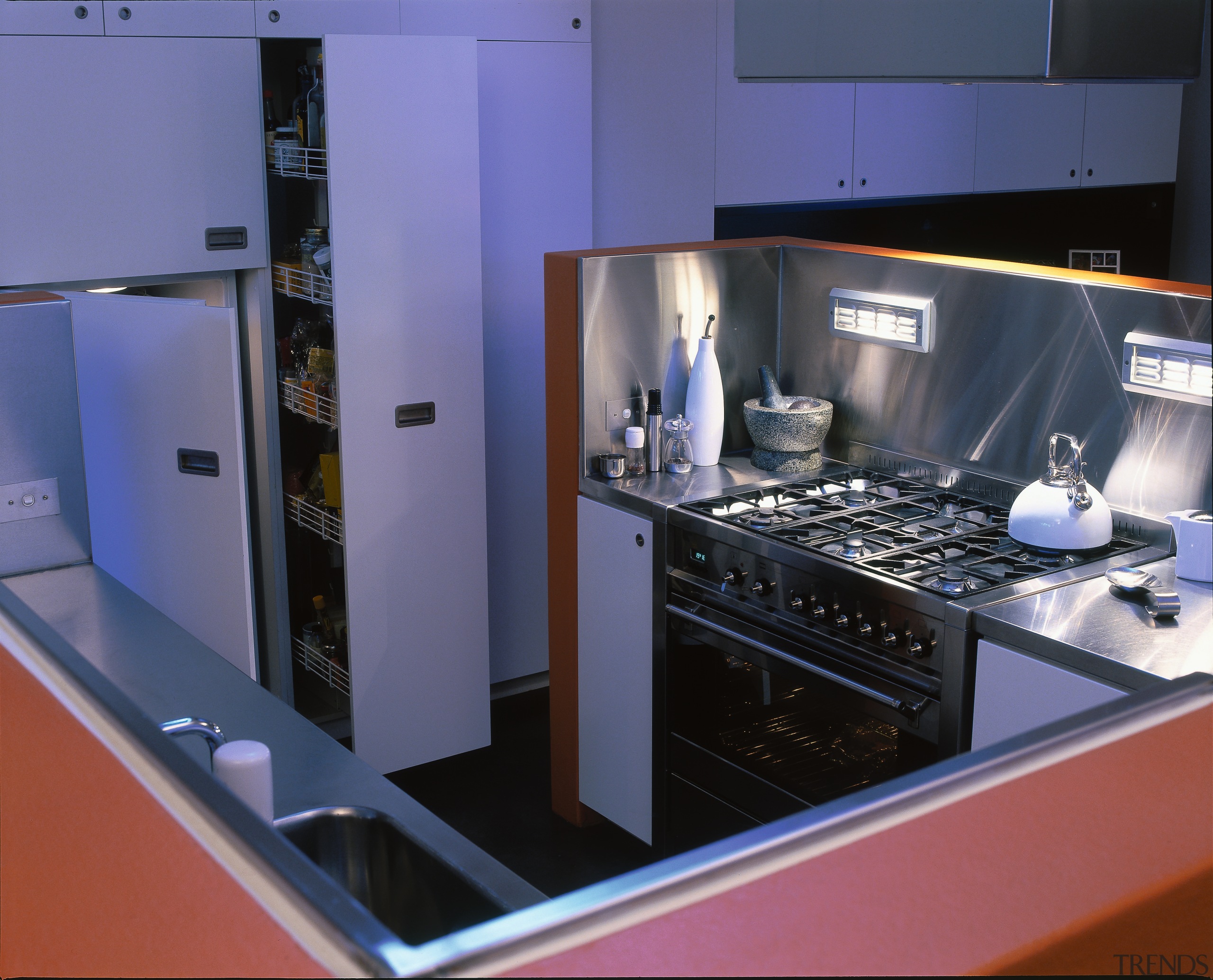 The detail of a central kitchen block - countertop, home appliance, interior design, kitchen, blue, black