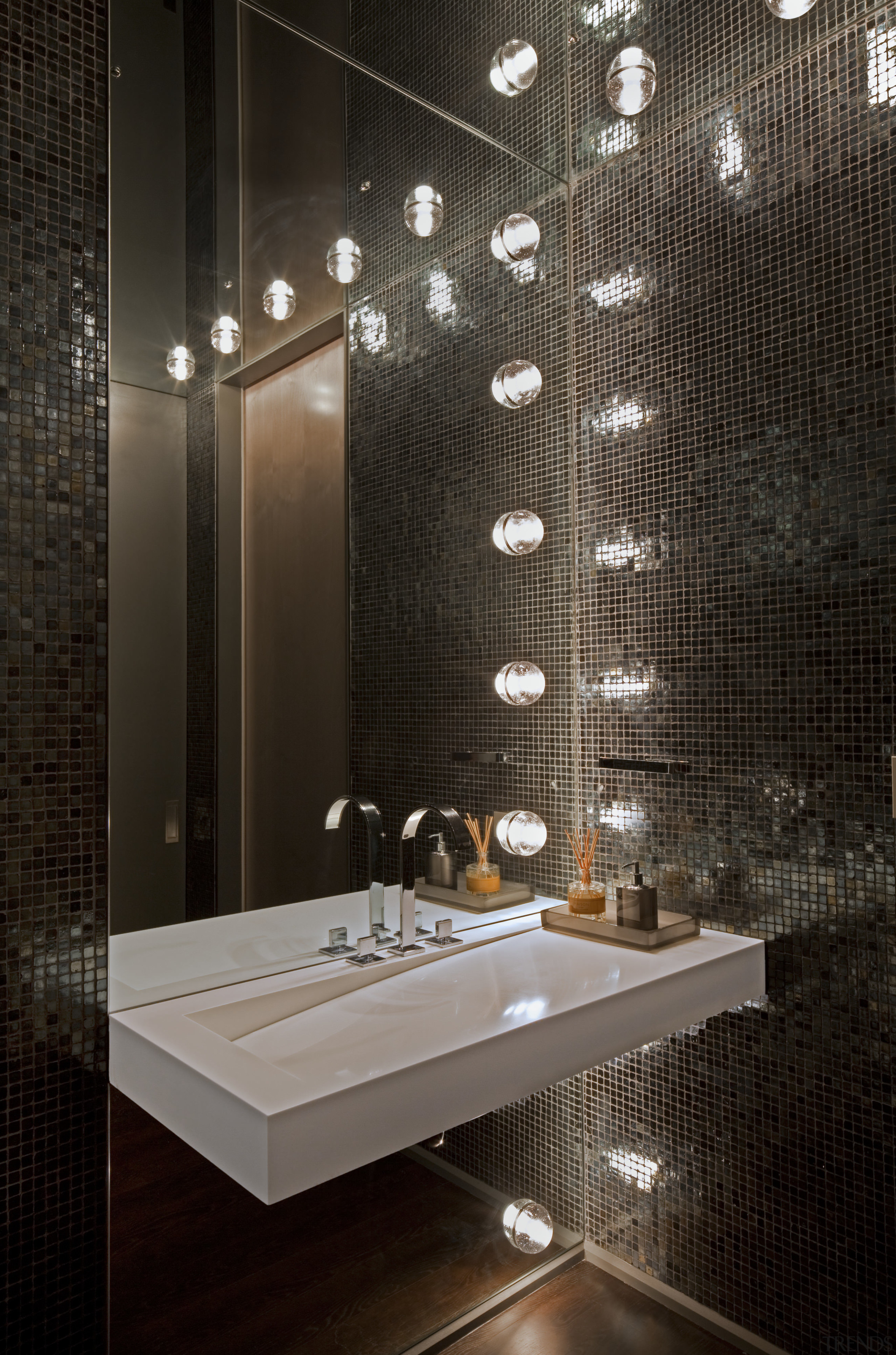 Hollywood lights in this powder room are a architecture, bathroom, ceiling, daylighting, flooring, interior design, light fixture, lighting, tile, wall, black