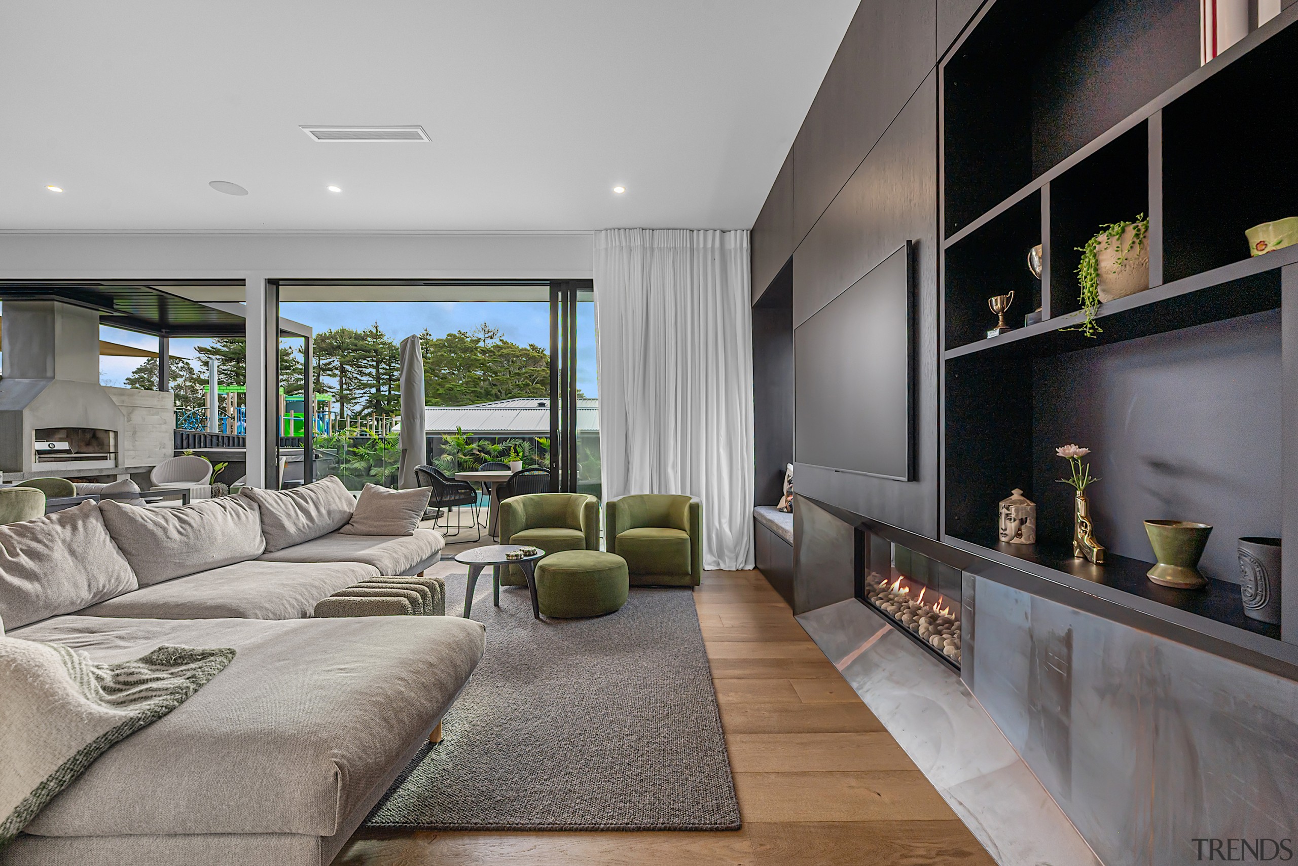View showing fireplace, wood flooring and the space's 