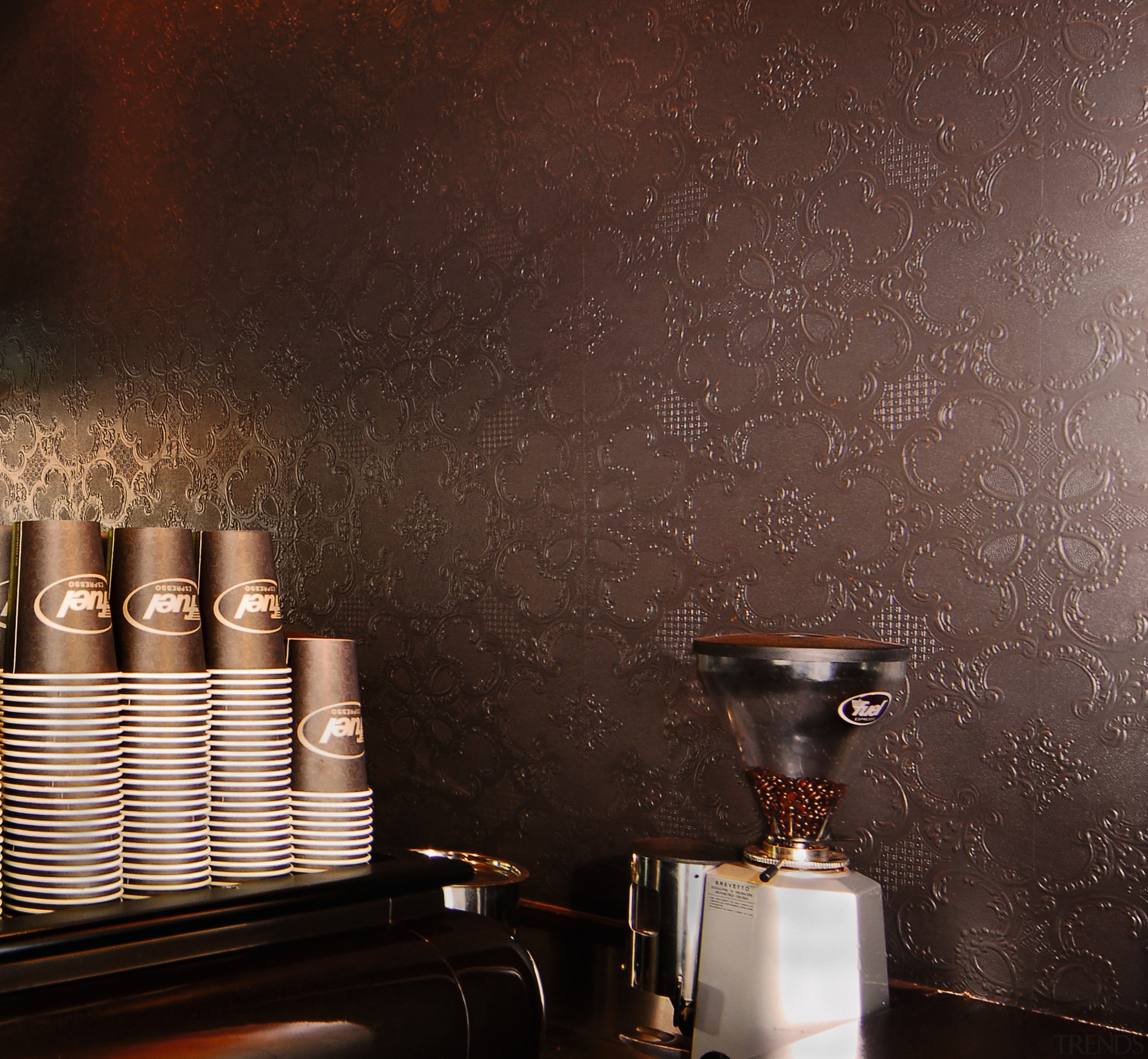 A view of this interior wall featuring a ceiling, interior design, still life photography, wall, wallpaper, black