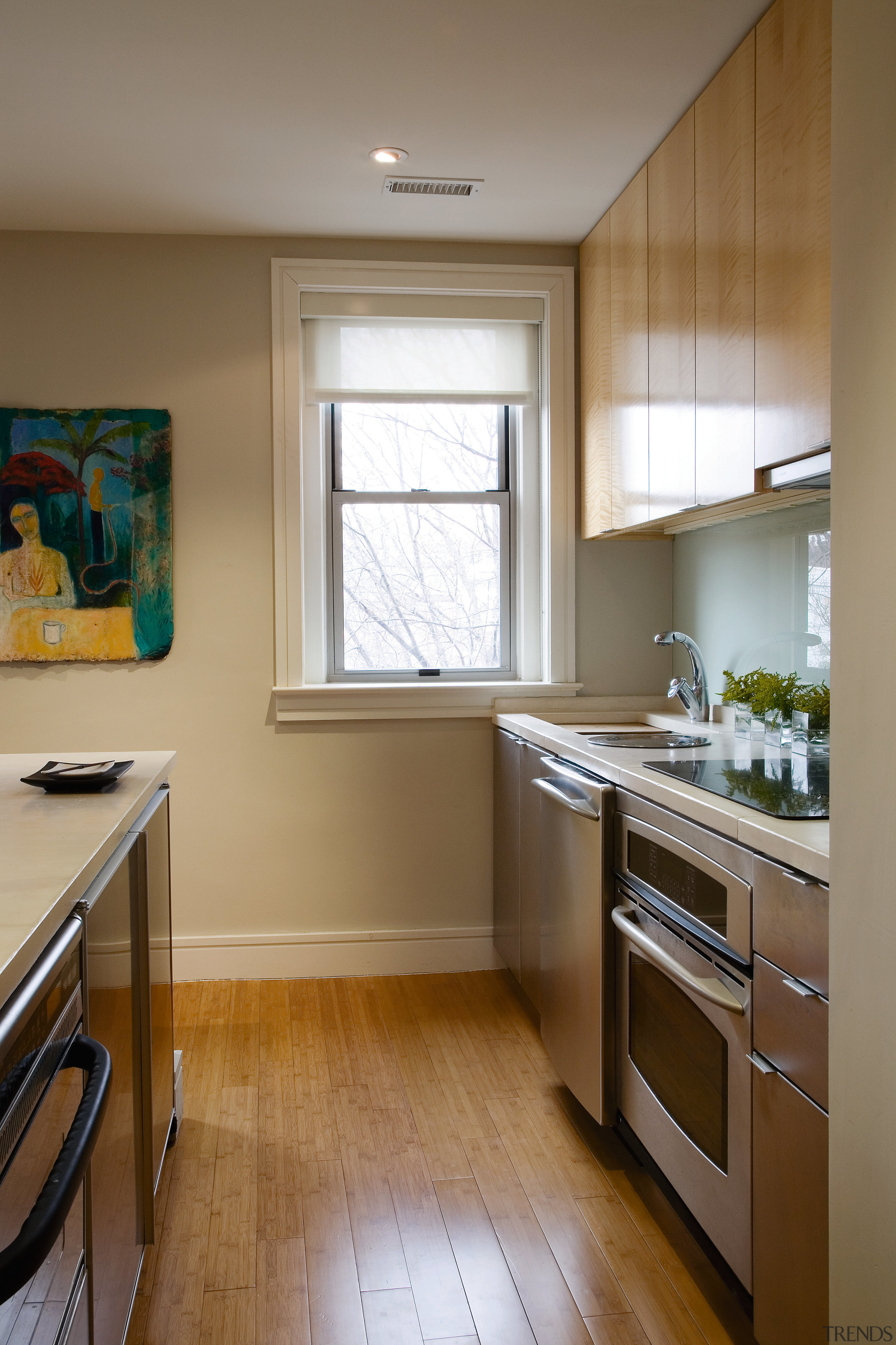 A view of the kitchen, wooden flooring and cabinetry, countertop, cuisine classique, floor, flooring, home, interior design, kitchen, real estate, room, window, brown, gray