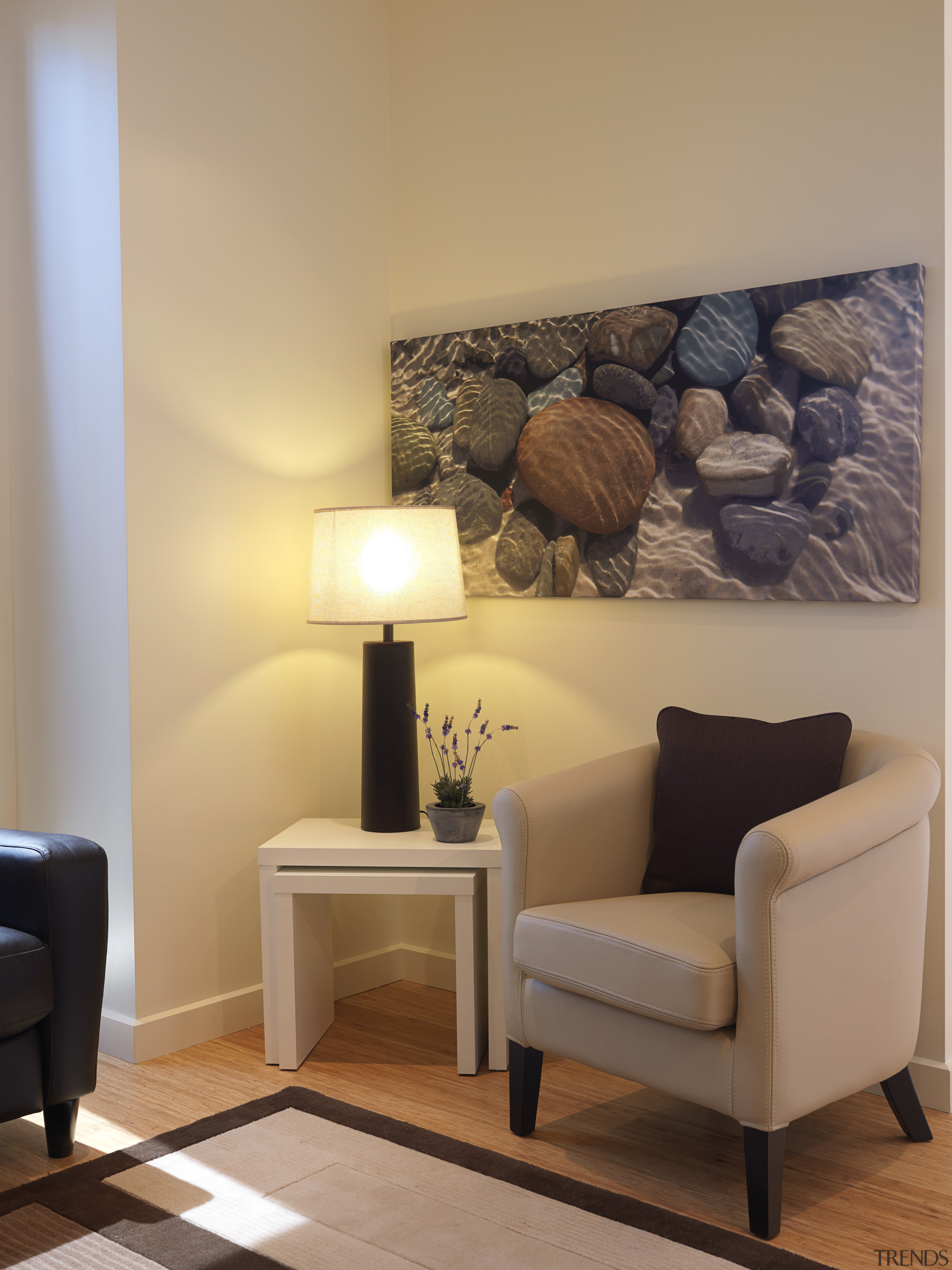 Every square metre of the apartments is designed floor, flooring, furniture, home, interior design, living room, room, table, wall, orange