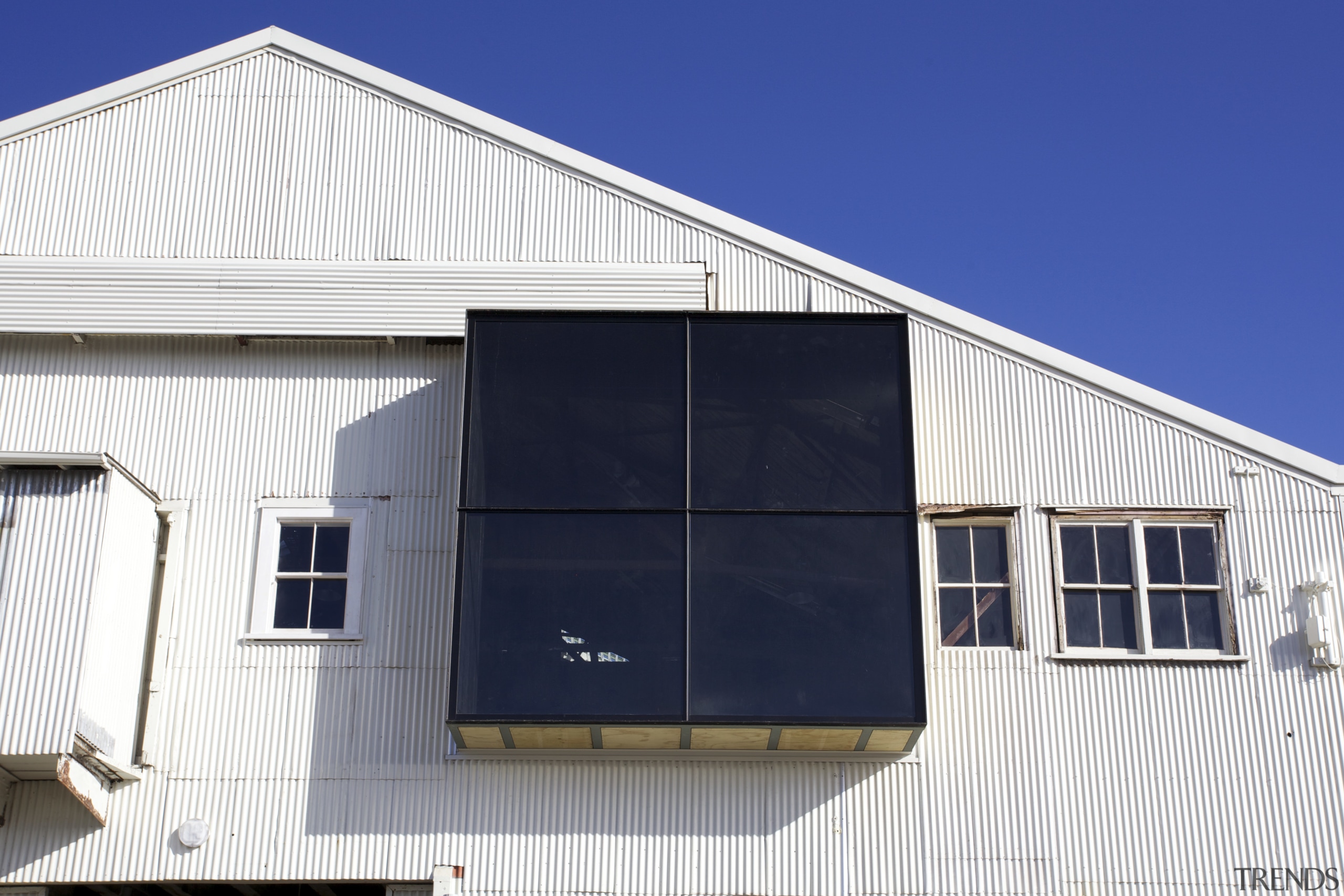 Well framed  high-performance joinery for Shed 10 architecture, building, daylighting, elevation, facade, home, house, real estate, roof, shed, siding, structure, window, blue, white