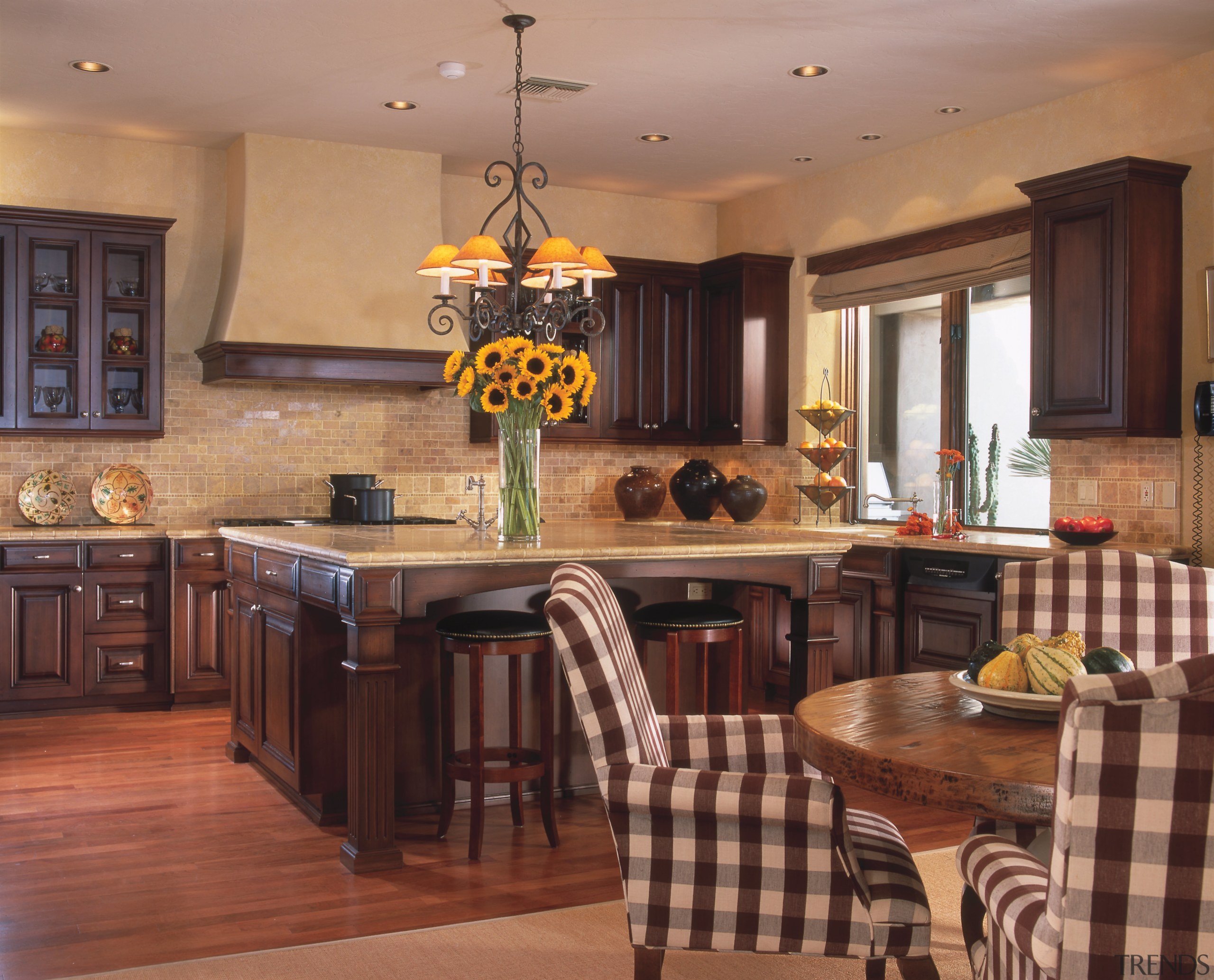 A view of the dining and kitchen areas cabinetry, countertop, cuisine classique, dining room, interior design, kitchen, room, brown