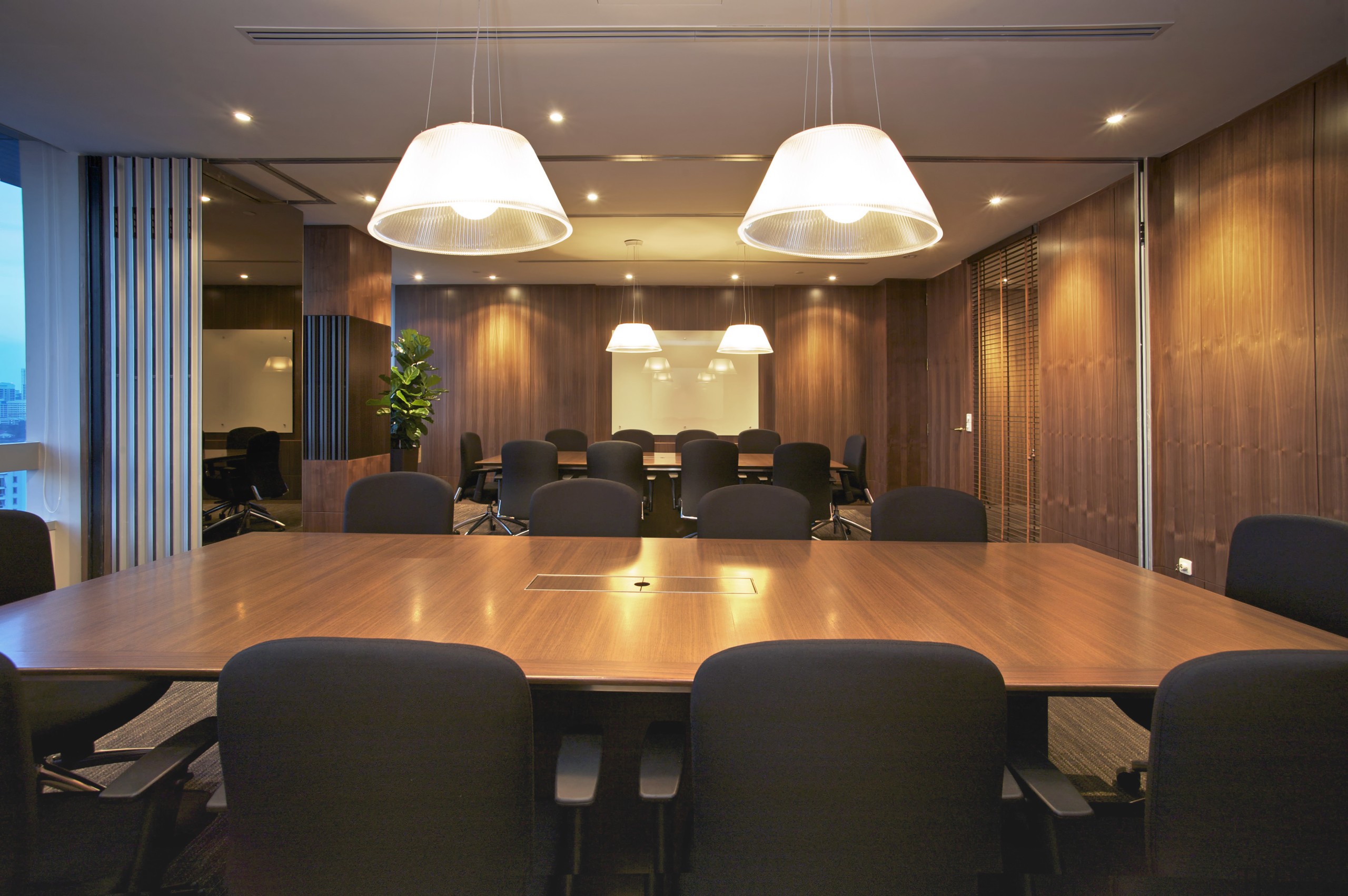 View of updated offices featuring dark timber floors, ceiling, conference hall, dining room, function hall, interior design, light fixture, lighting, room, table, black, brown