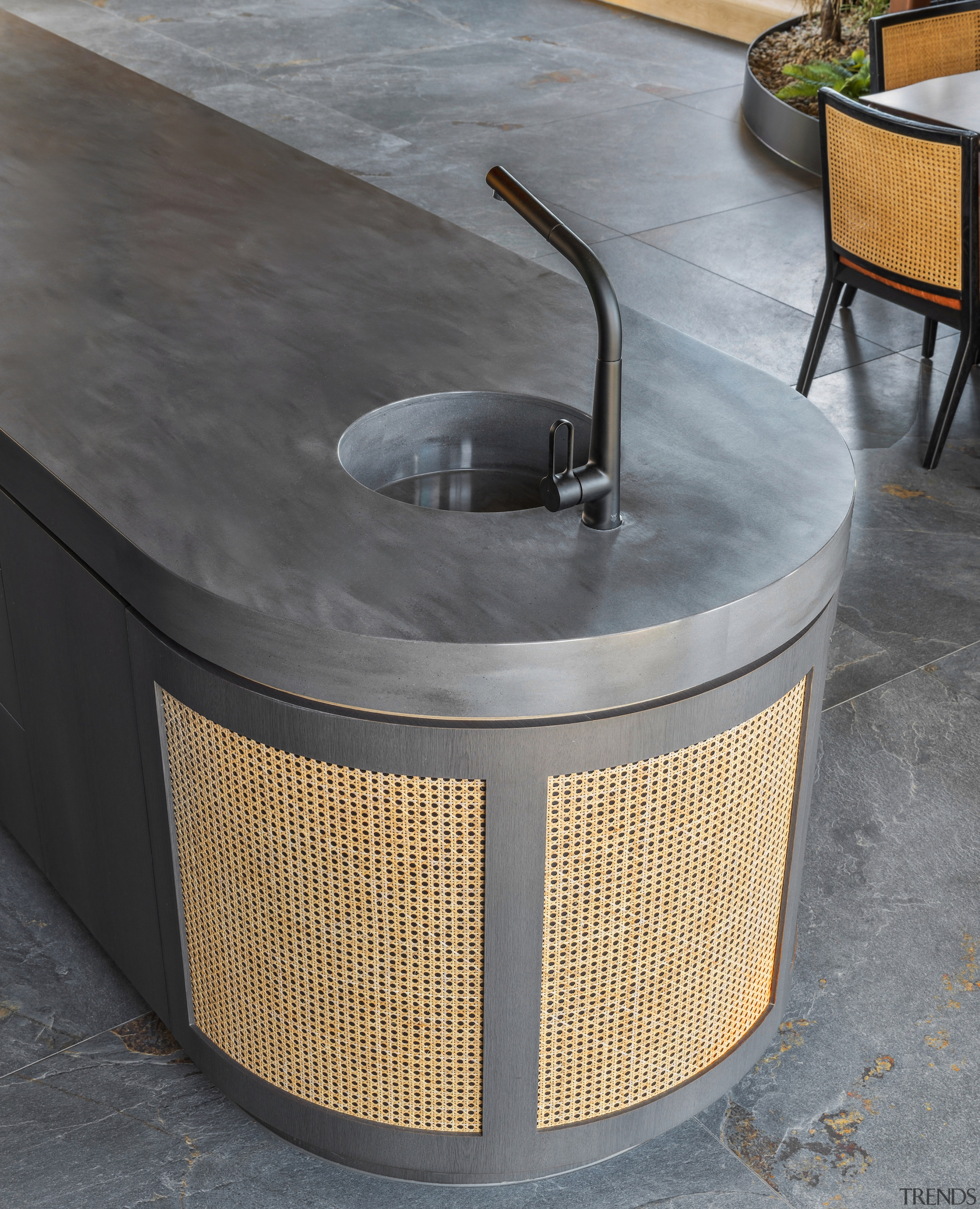 Wicker also surfaces on the kitchen island and 