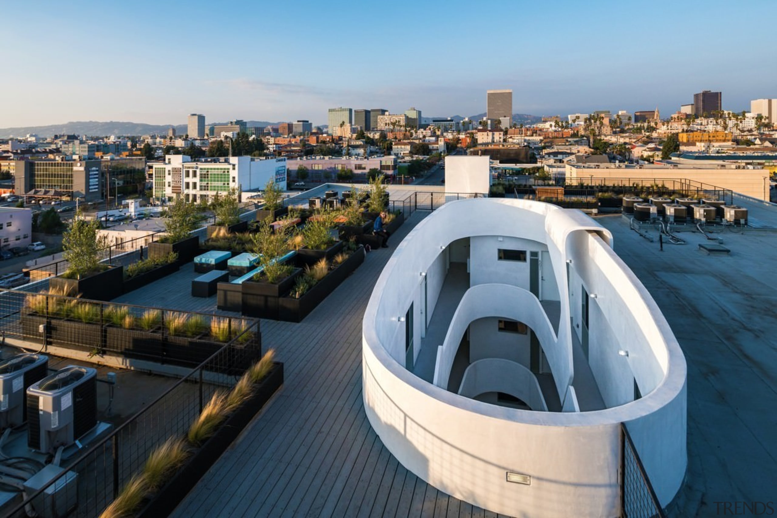 You can look over the rail and down architecture, city, downtown, real estate, roof, water, waterway, black