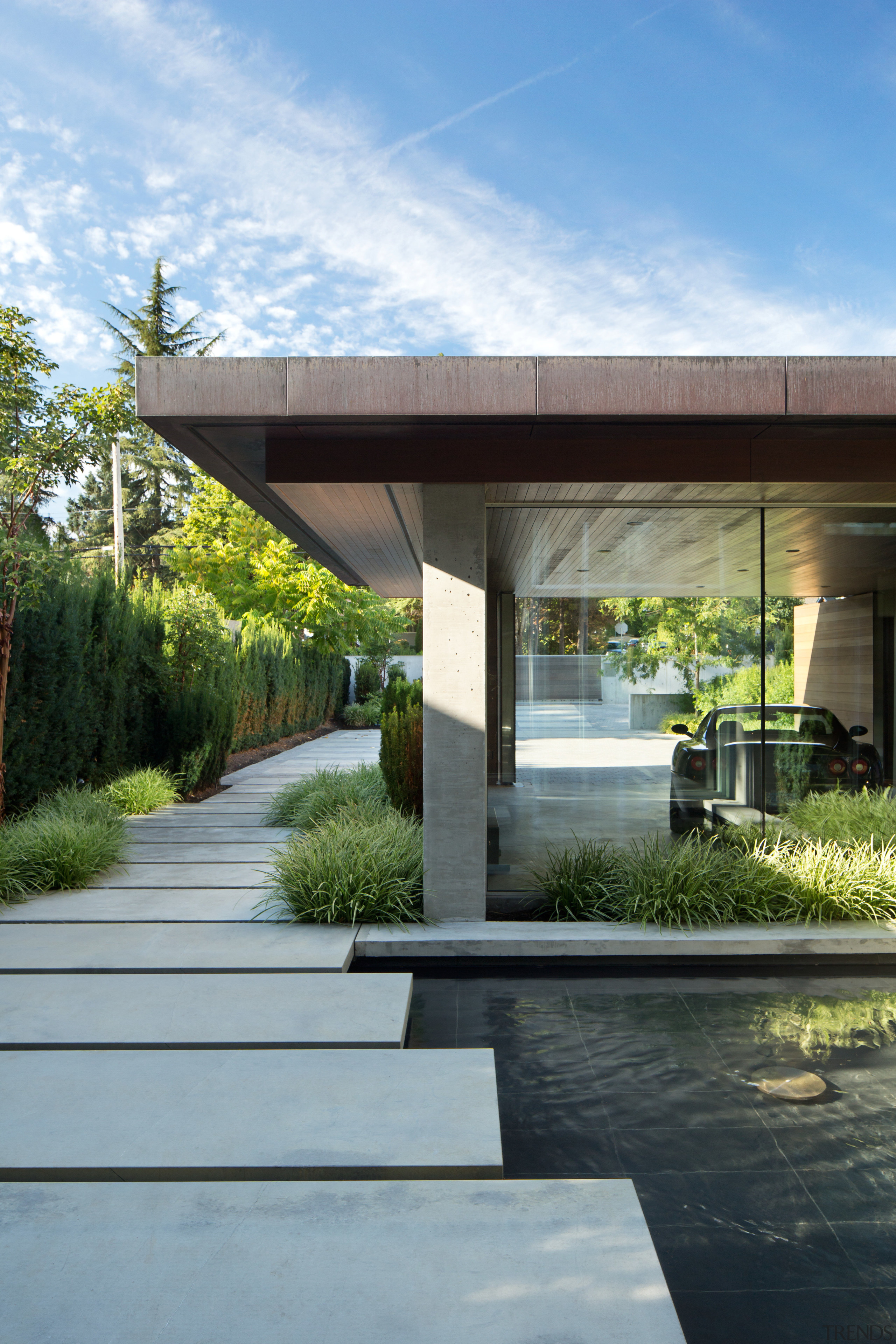 Although this garage sits in front of the architecture, house, real estate, residential area, gray