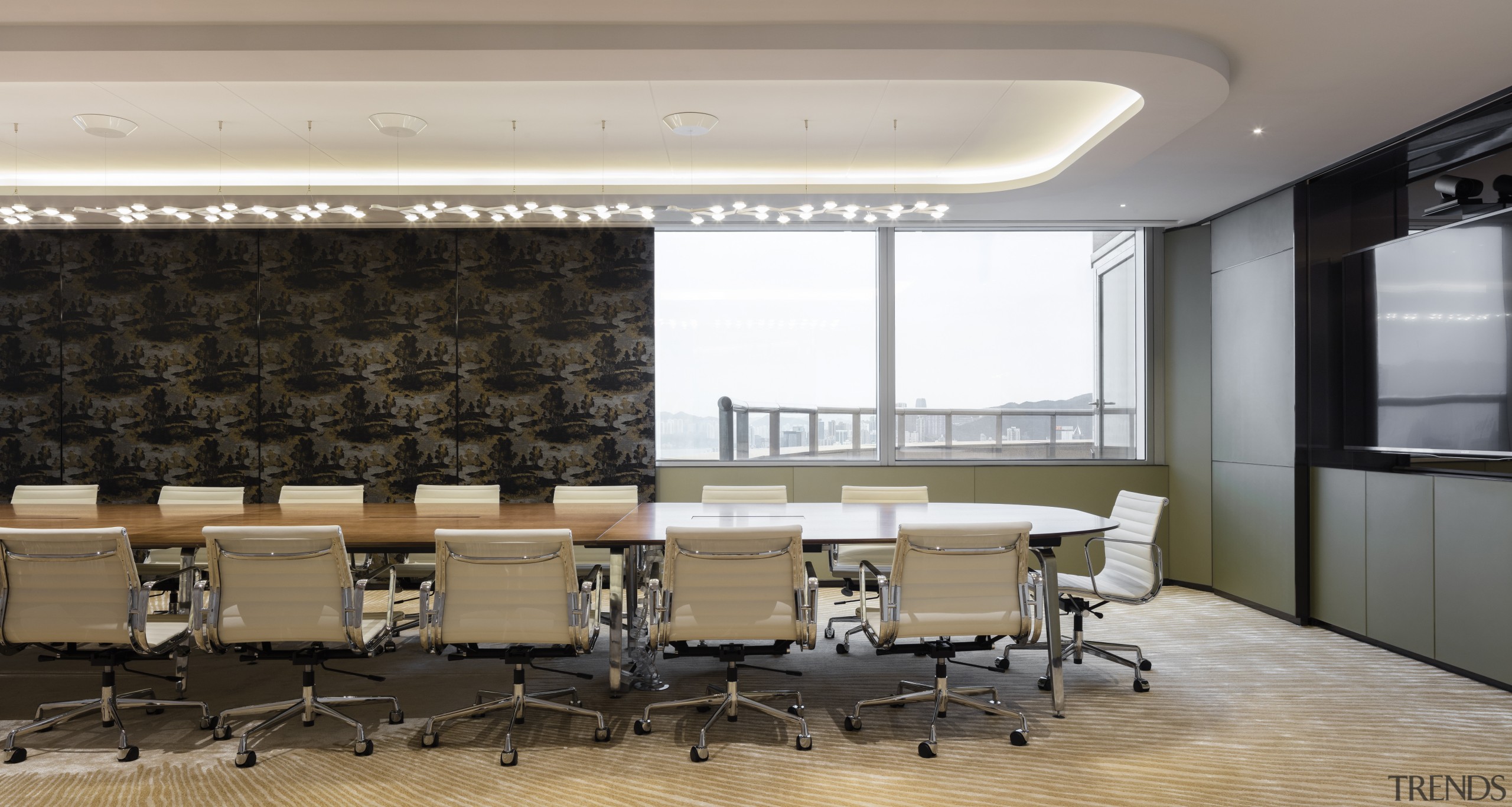 A cove ceiling and operable wall panels finished ceiling, conference hall, flooring, interior design, table, wall, gray