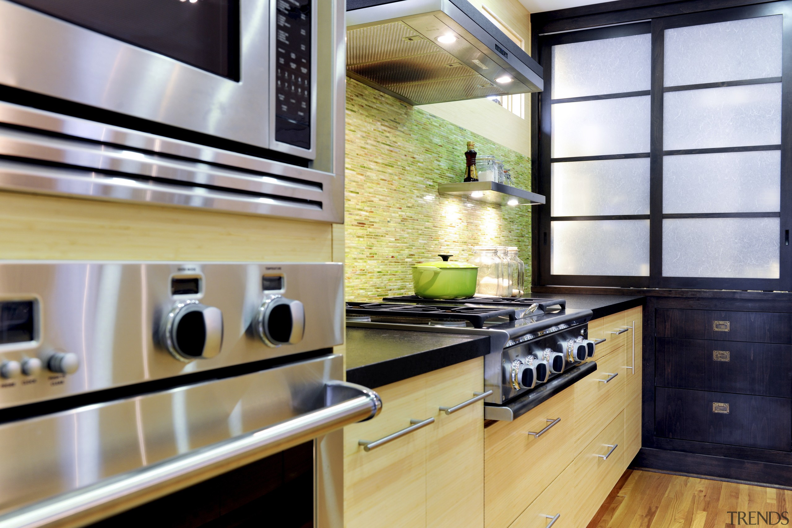 View of kitchen and dining area with Japanese cabinetry, countertop, interior design, kitchen, under cabinet lighting, gray