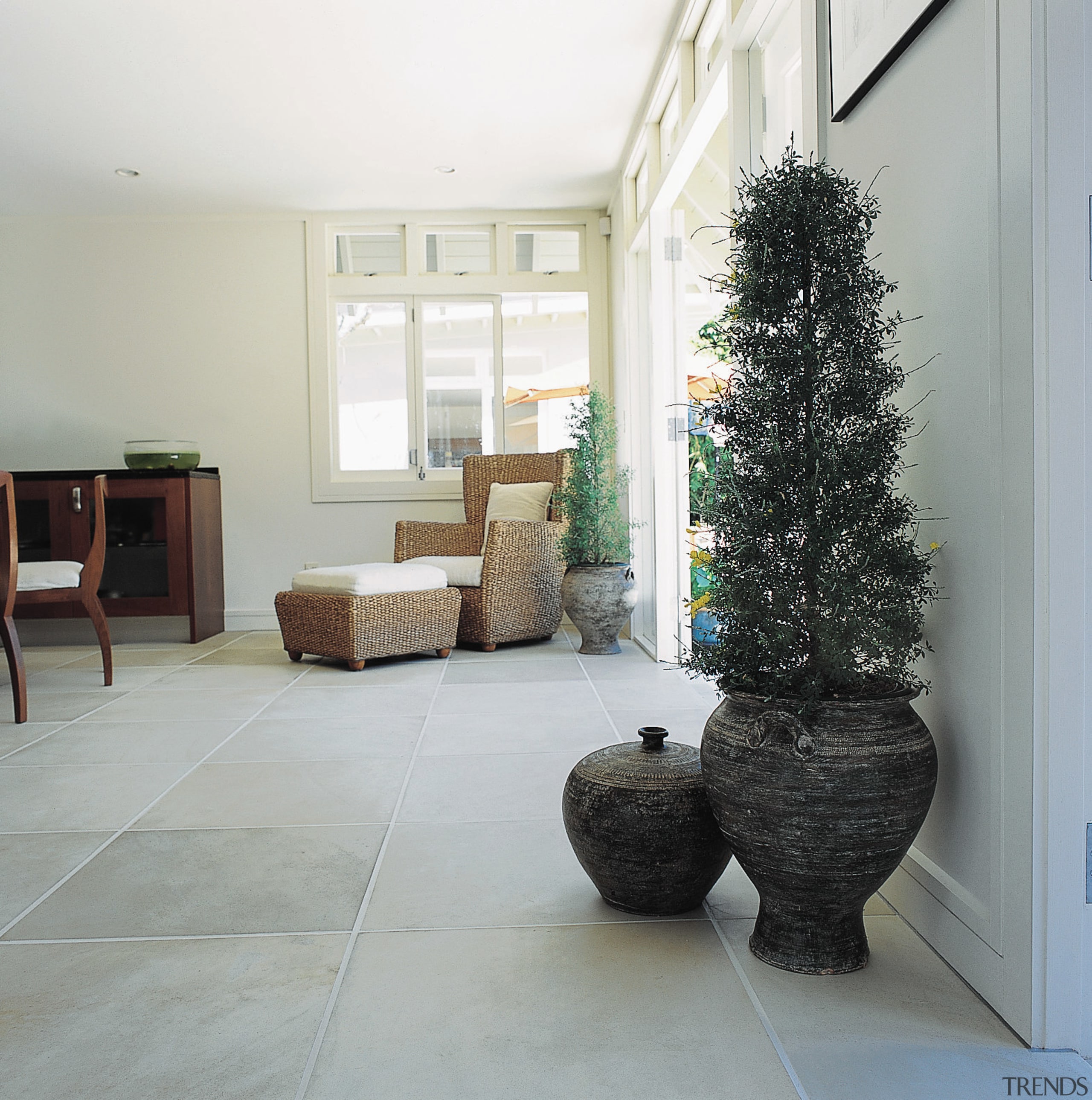 Room with natural sandstone paver flooring. - Room floor, flooring, hardwood, home, house, interior design, living room, property, real estate, room, window, wood, wood flooring, gray
