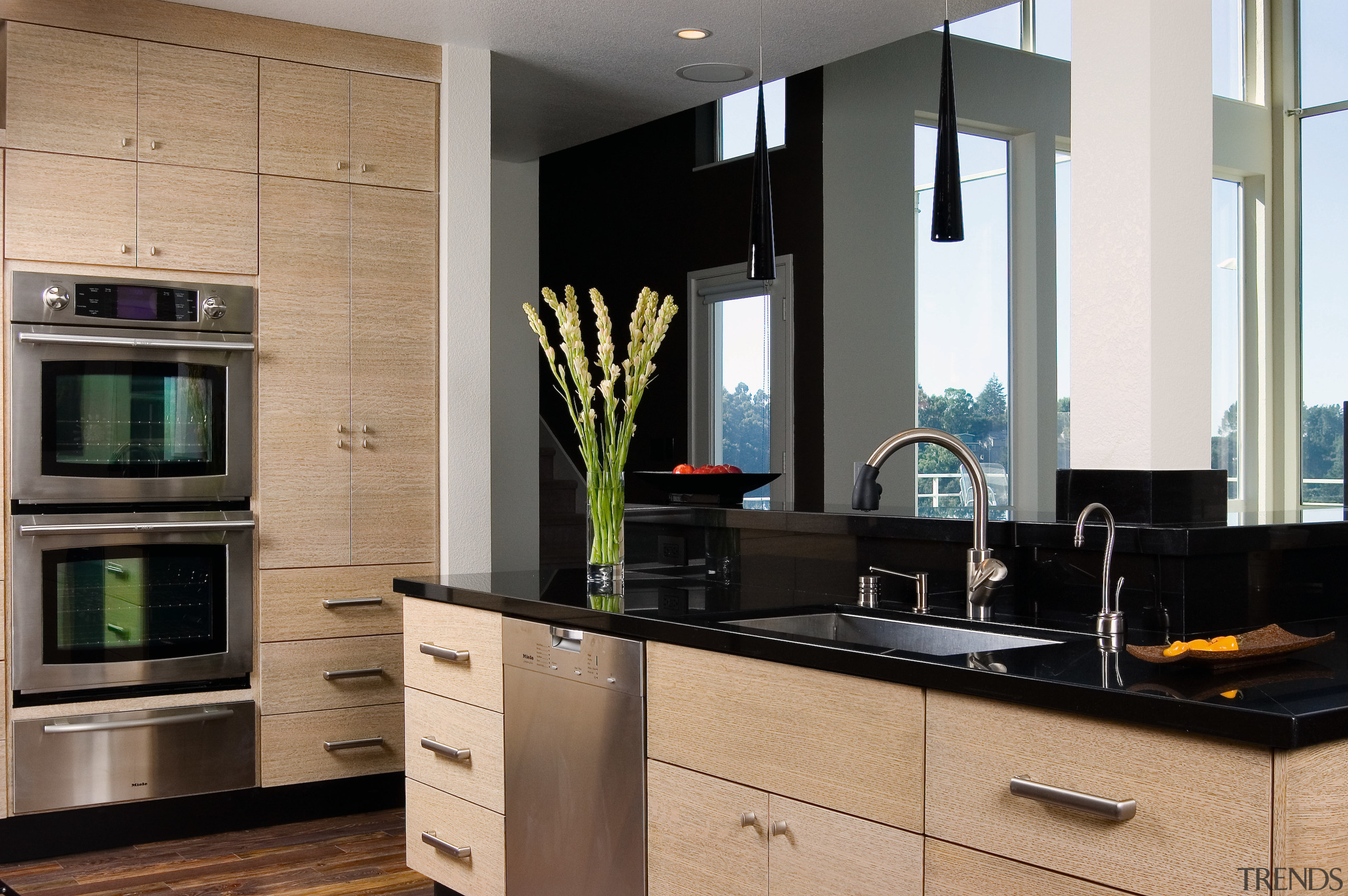 A close up view of the kitchen sink cabinetry, countertop, cuisine classique, home appliance, interior design, kitchen, room, gray, black