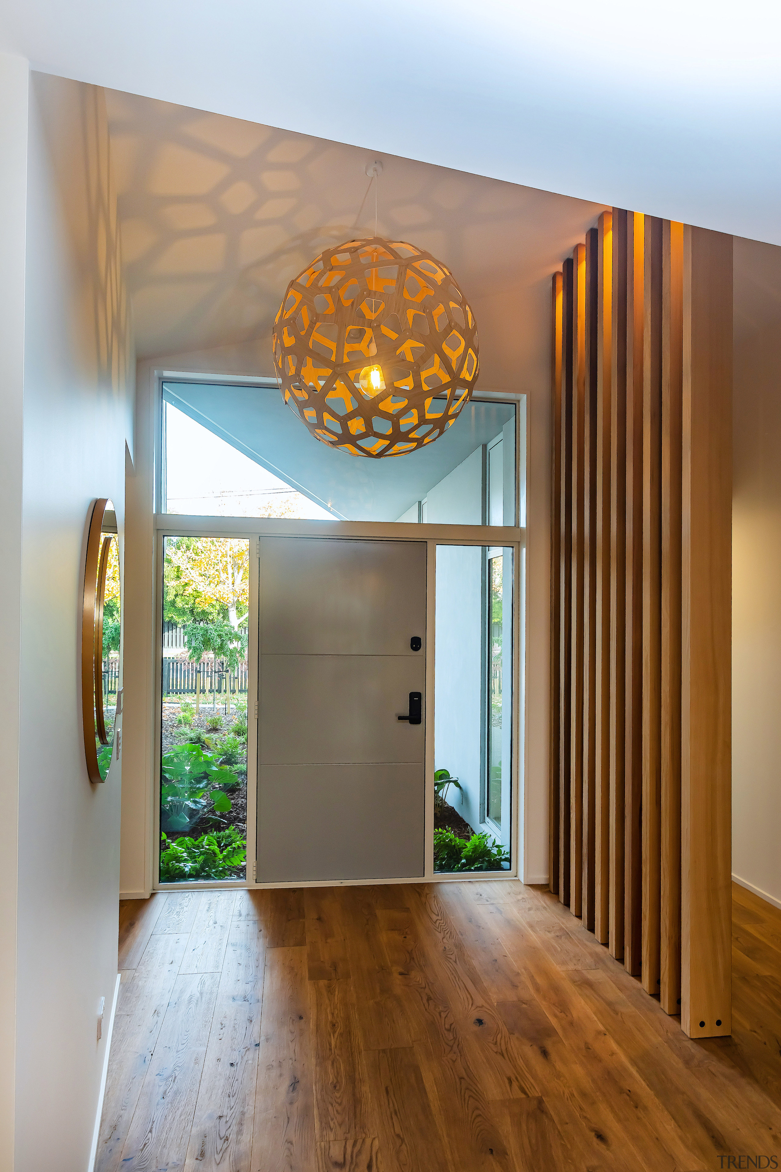 Wood-finished entry space. - Stand-out creativity on a 