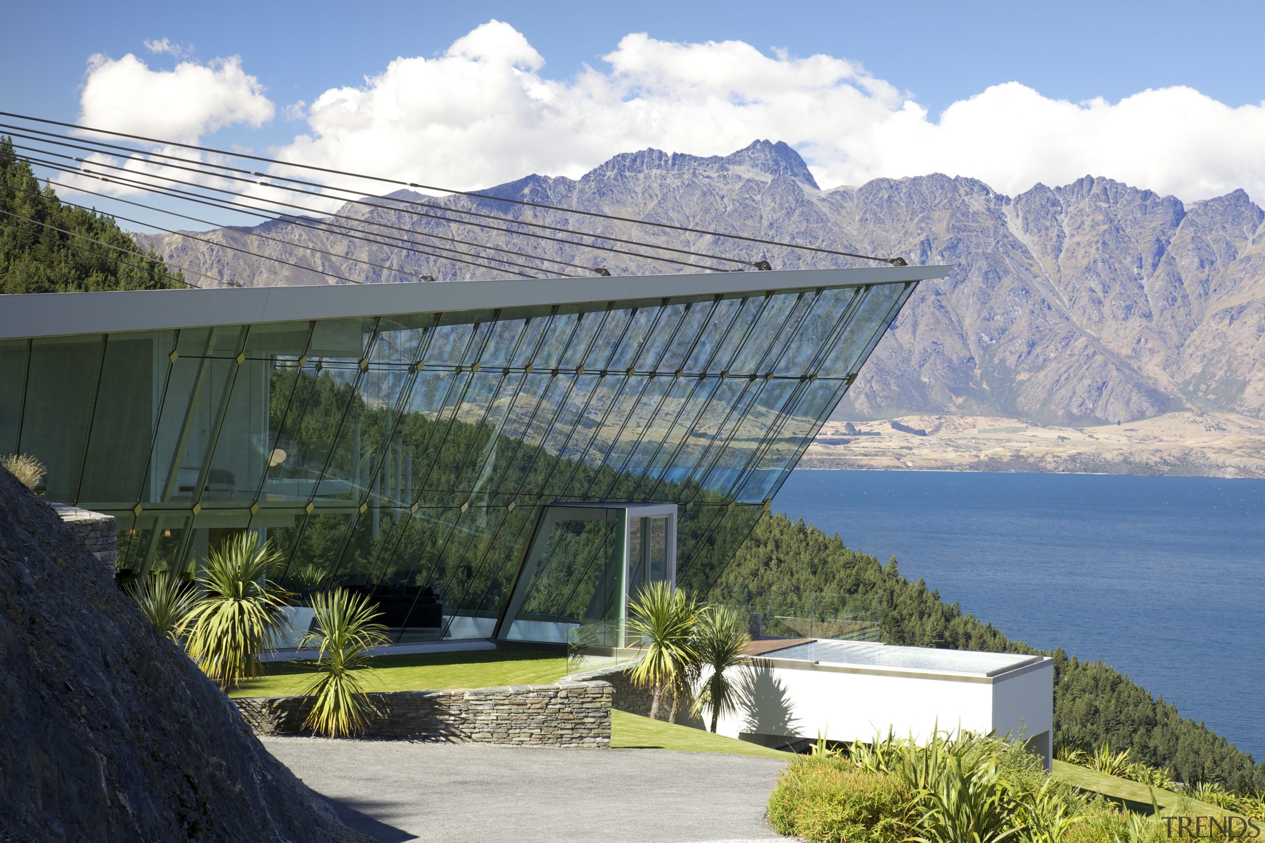 Off the edge  Queenstown glass pavilion Julian architecture, energy, house, mountain, mountain range, real estate, roof, sky, water