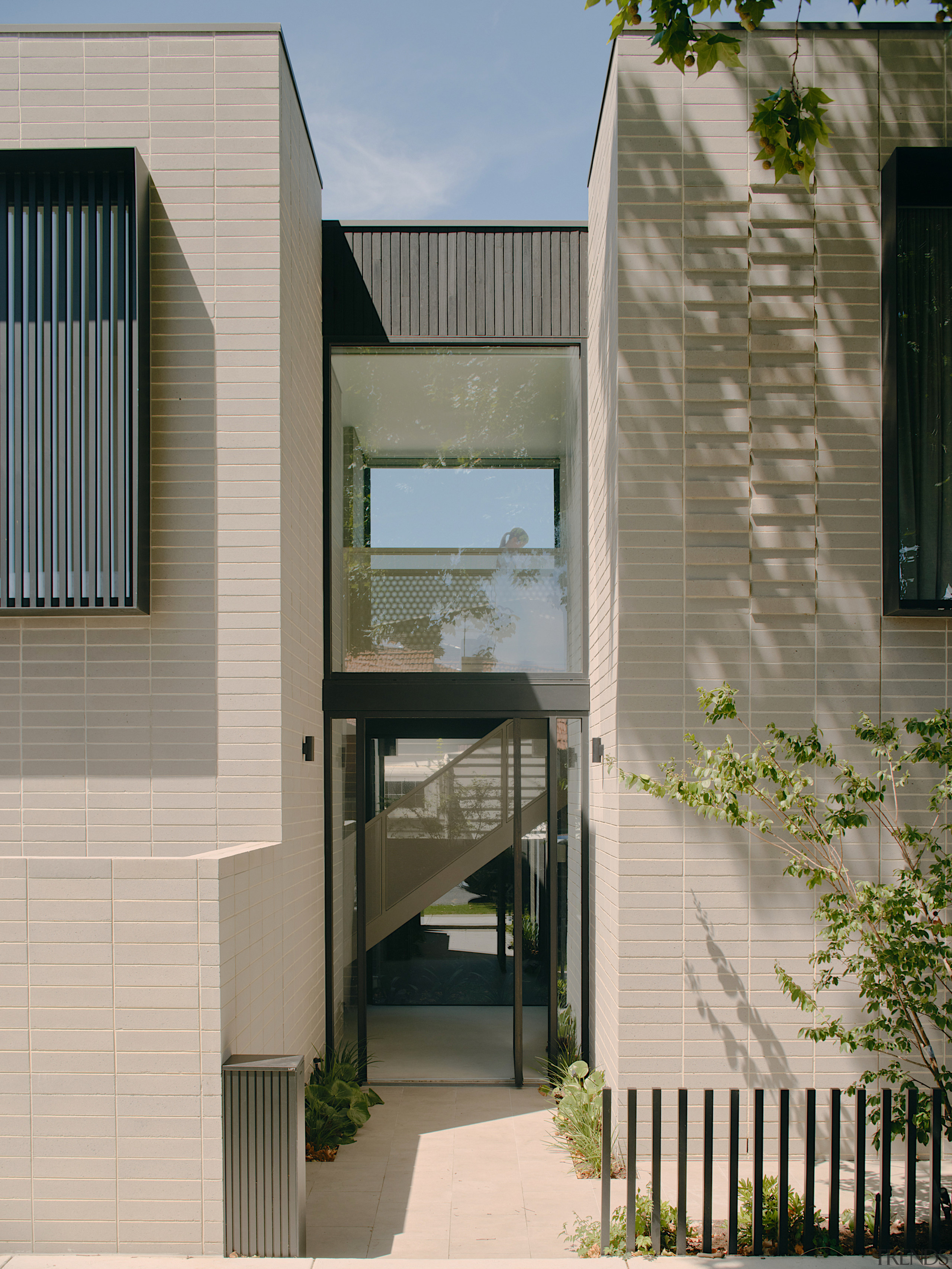 The home features a central light well, creating 