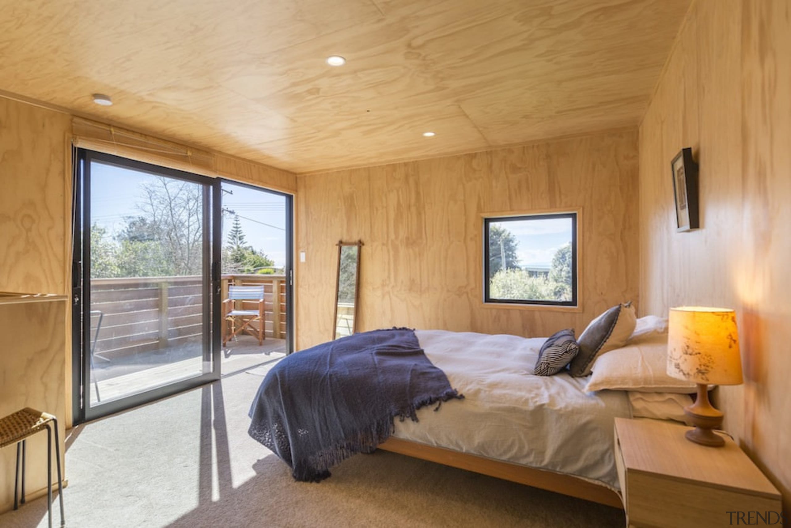 Graham Phipps Tiny House - Ruby Bay, architecture, bedroom, ceiling, daylighting, estate, floor, home, house, interior design, property, real estate, room, window, wood, orange