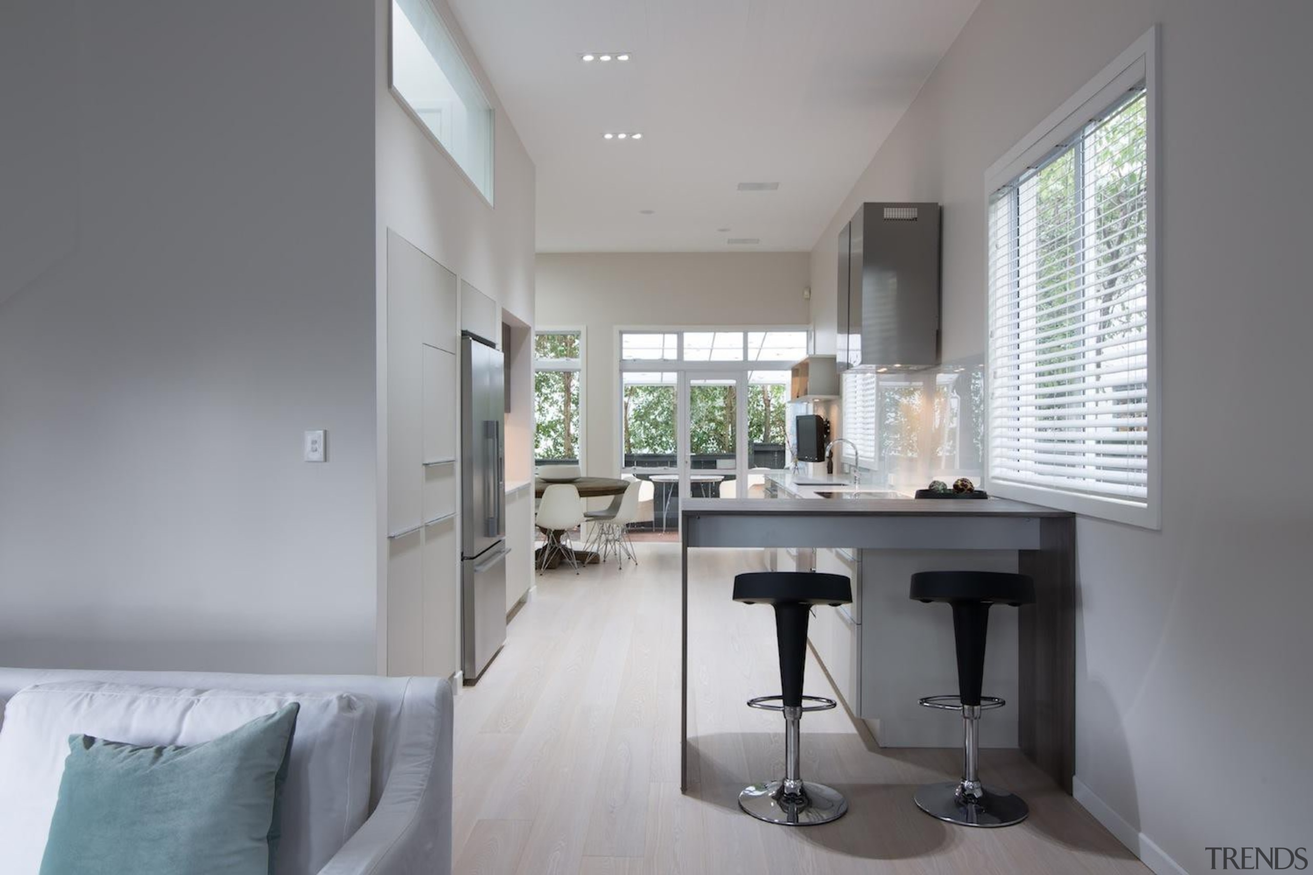 The teak bench top extention with elevated seating architecture, daylighting, floor, home, house, interior design, property, real estate, window, gray