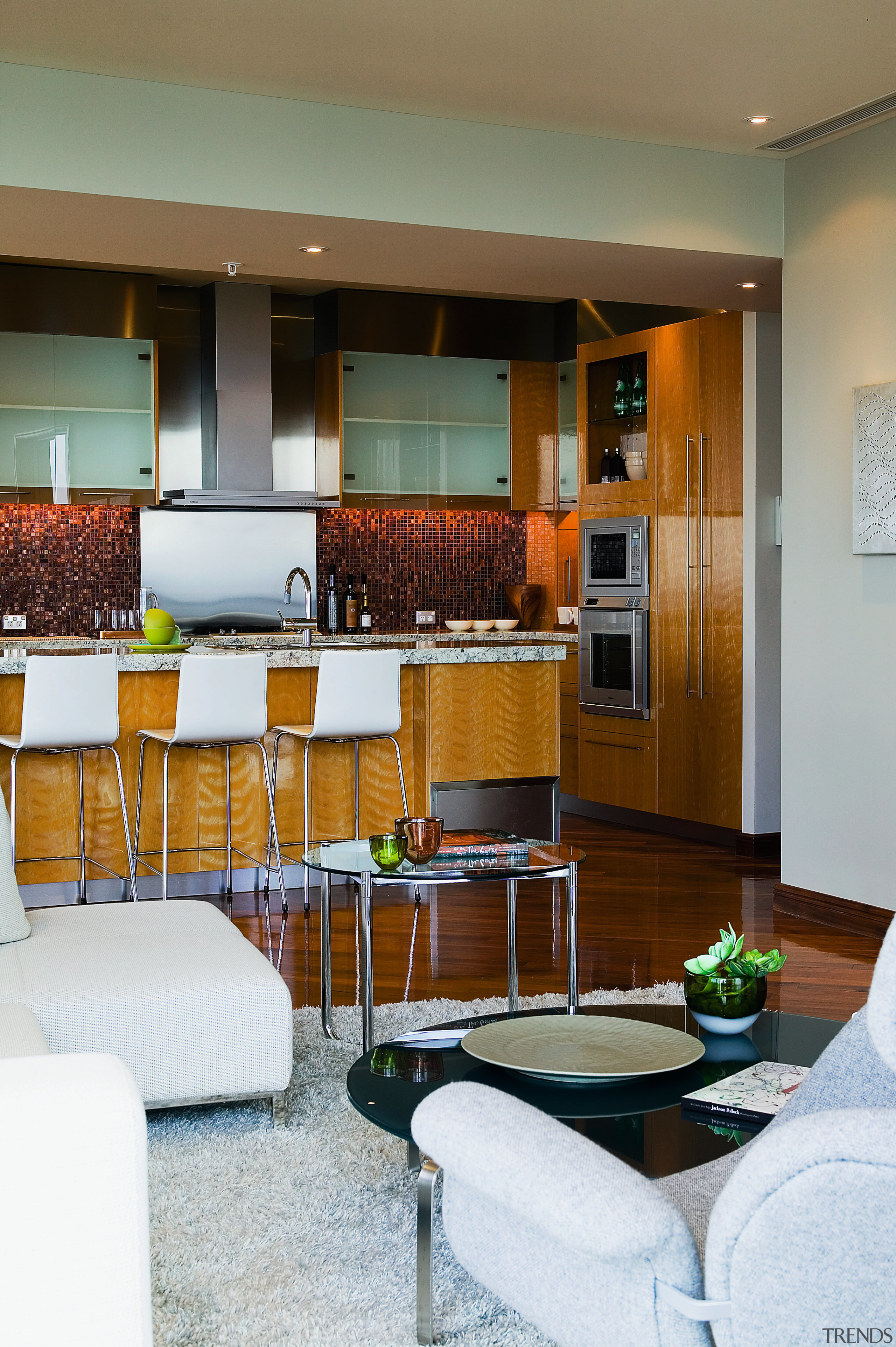 view of the kitchen/living featuring frosted glass cabinetry, home, interior design, living room, room, brown, white