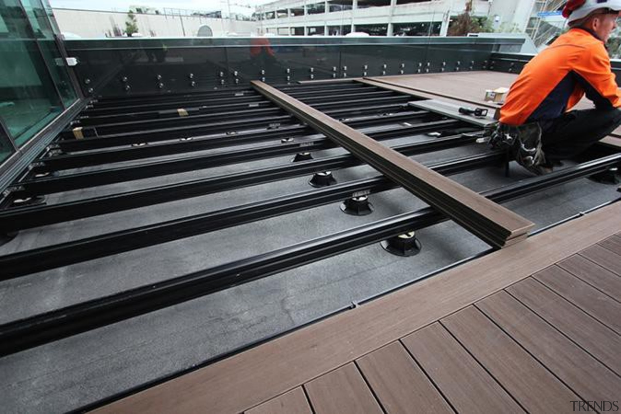 This large beautiful staff decking facility was build daylighting, floor, metal, roof, steel, wood, gray, black