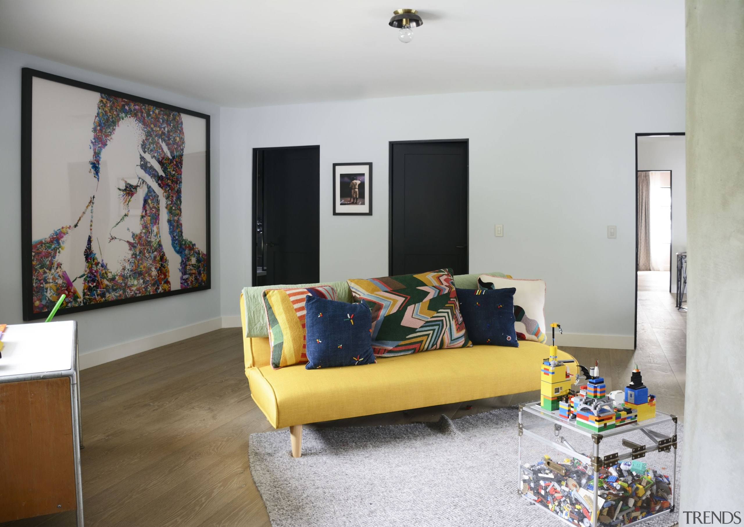 Large, colourful artworks are seen in most rooms. 