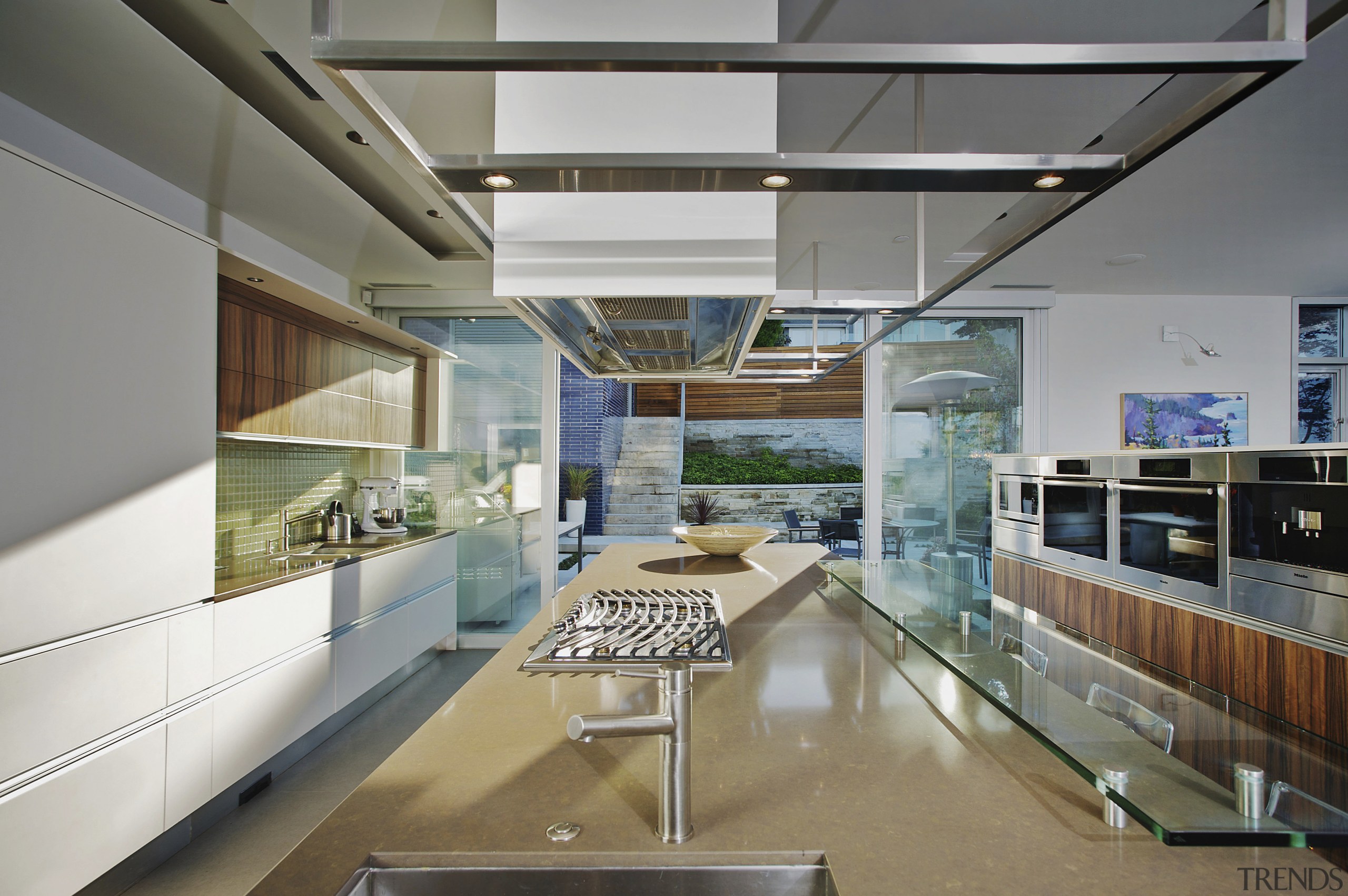 View of contemporary kitchen with beige toned benchtop. architecture, countertop, daylighting, interior design, kitchen, gray