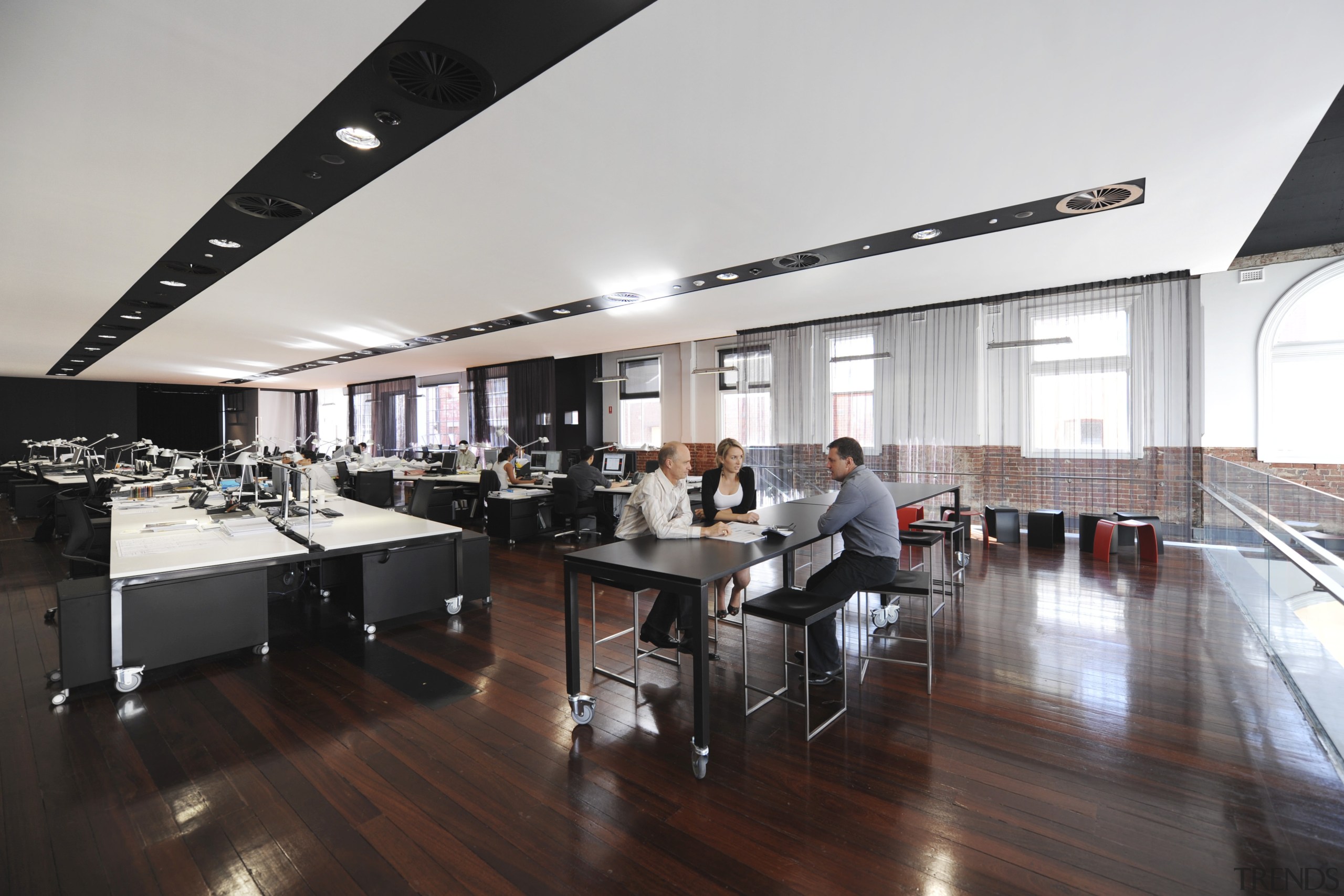 Architectural firm Coz Howlett &amp; Bailey Woodland relocated floor, flooring, interior design, office, white, black