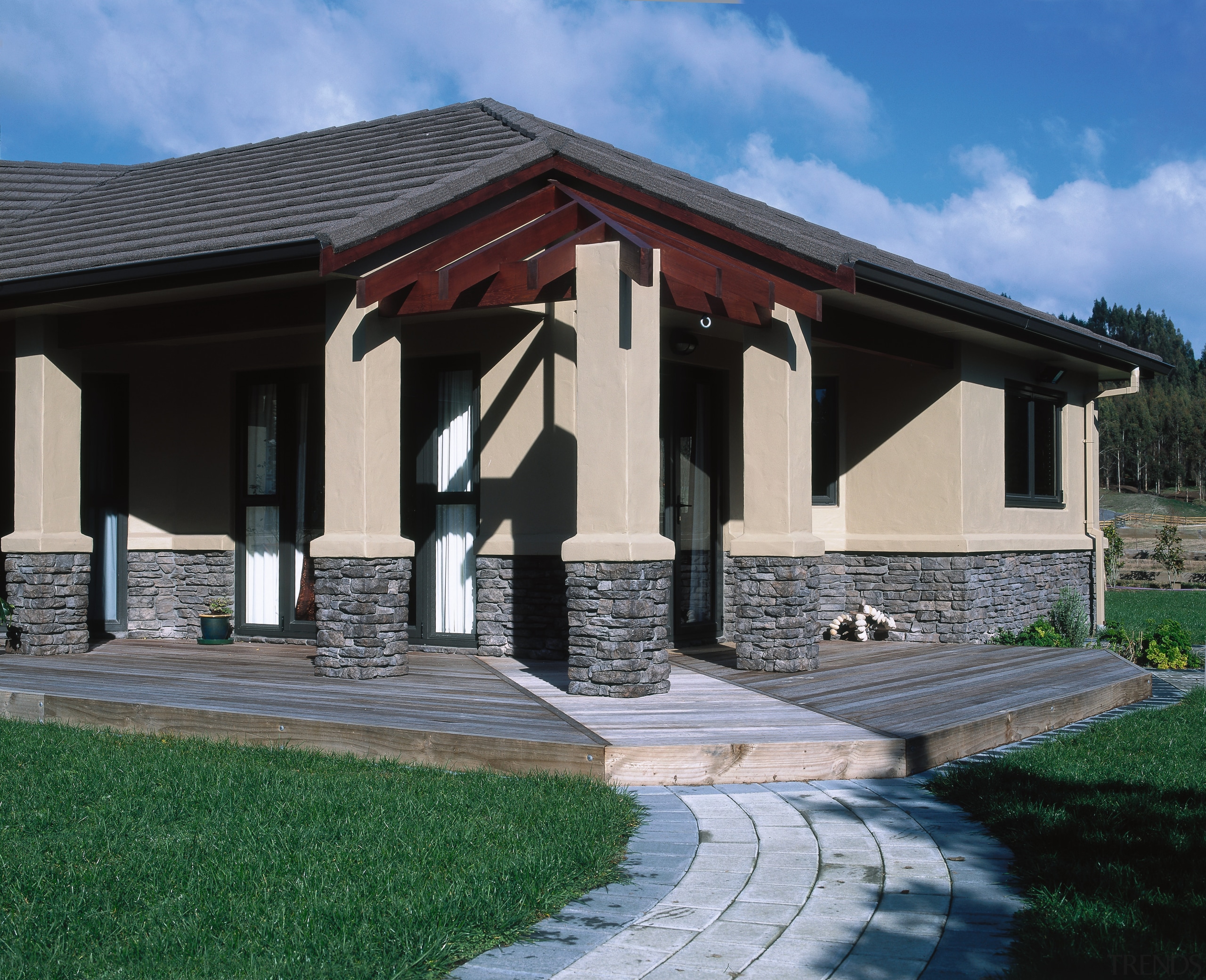 Entrance way of cream house with grey schist cottage, estate, facade, home, house, outdoor structure, property, real estate, roof, siding, villa, black, gray