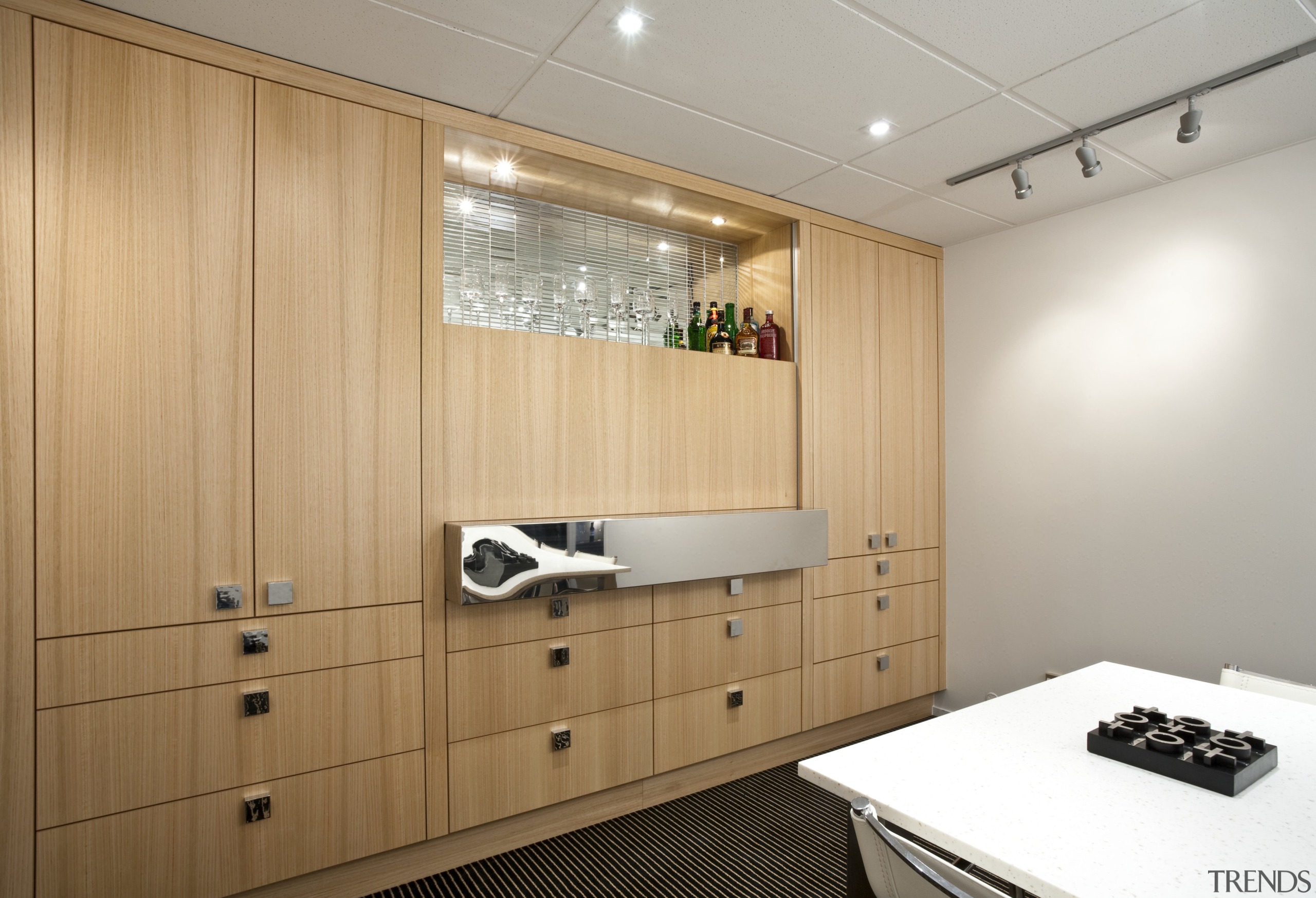 This storage/bar unit by Yellowfox features an Bestwood cabinetry, ceiling, floor, flooring, interior design, room, gray, orange