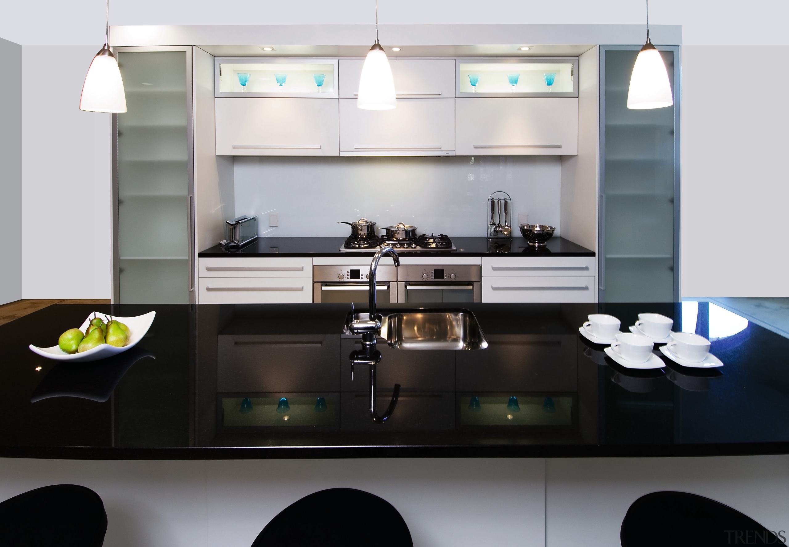 A view of a kitchen by Thermotek Kitchens. countertop, interior design, kitchen, product design, room, white, black