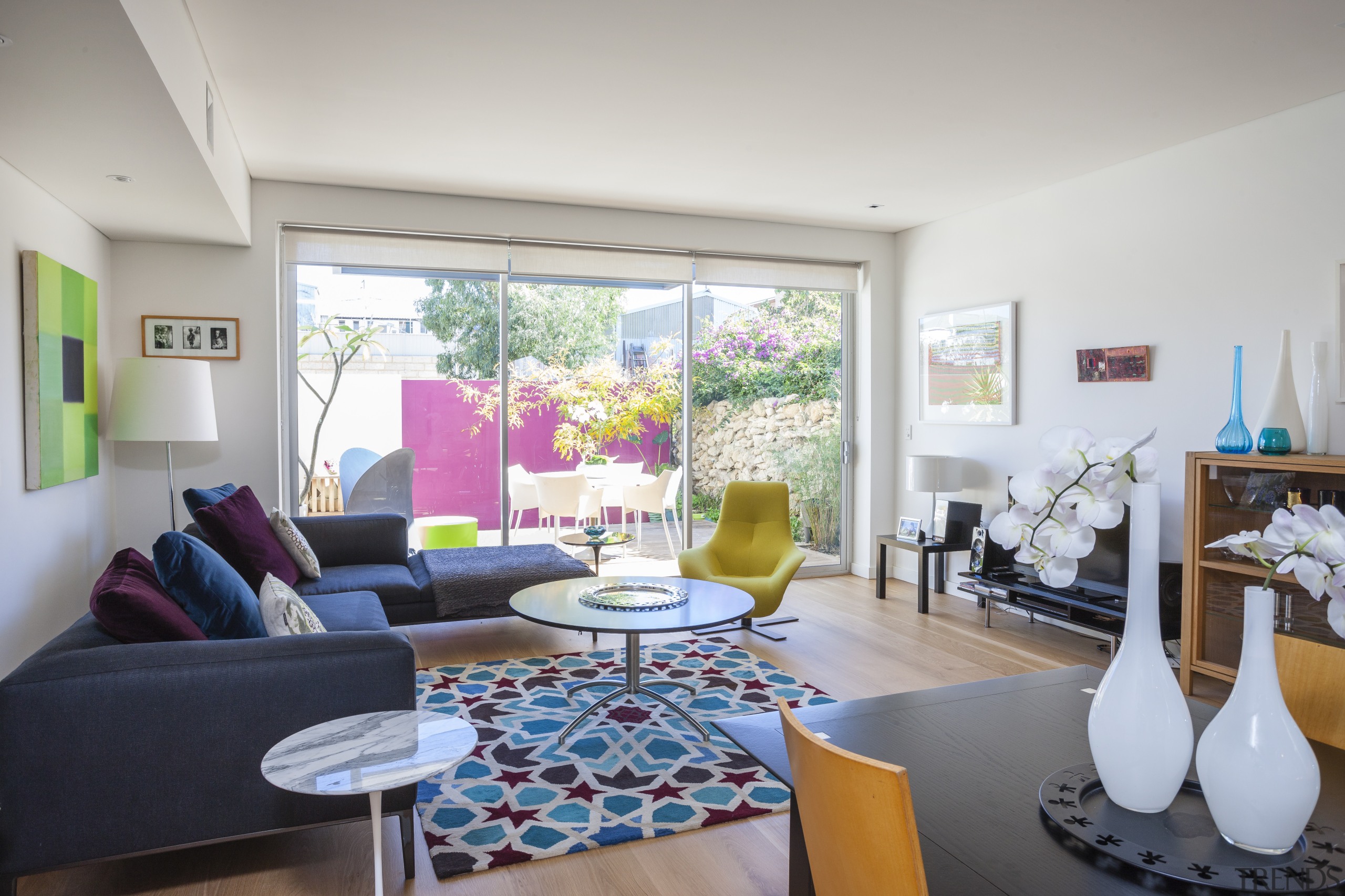 Colour accents enliven the interior of this contemporary home, house, interior design, living room, property, real estate, room, table, gray