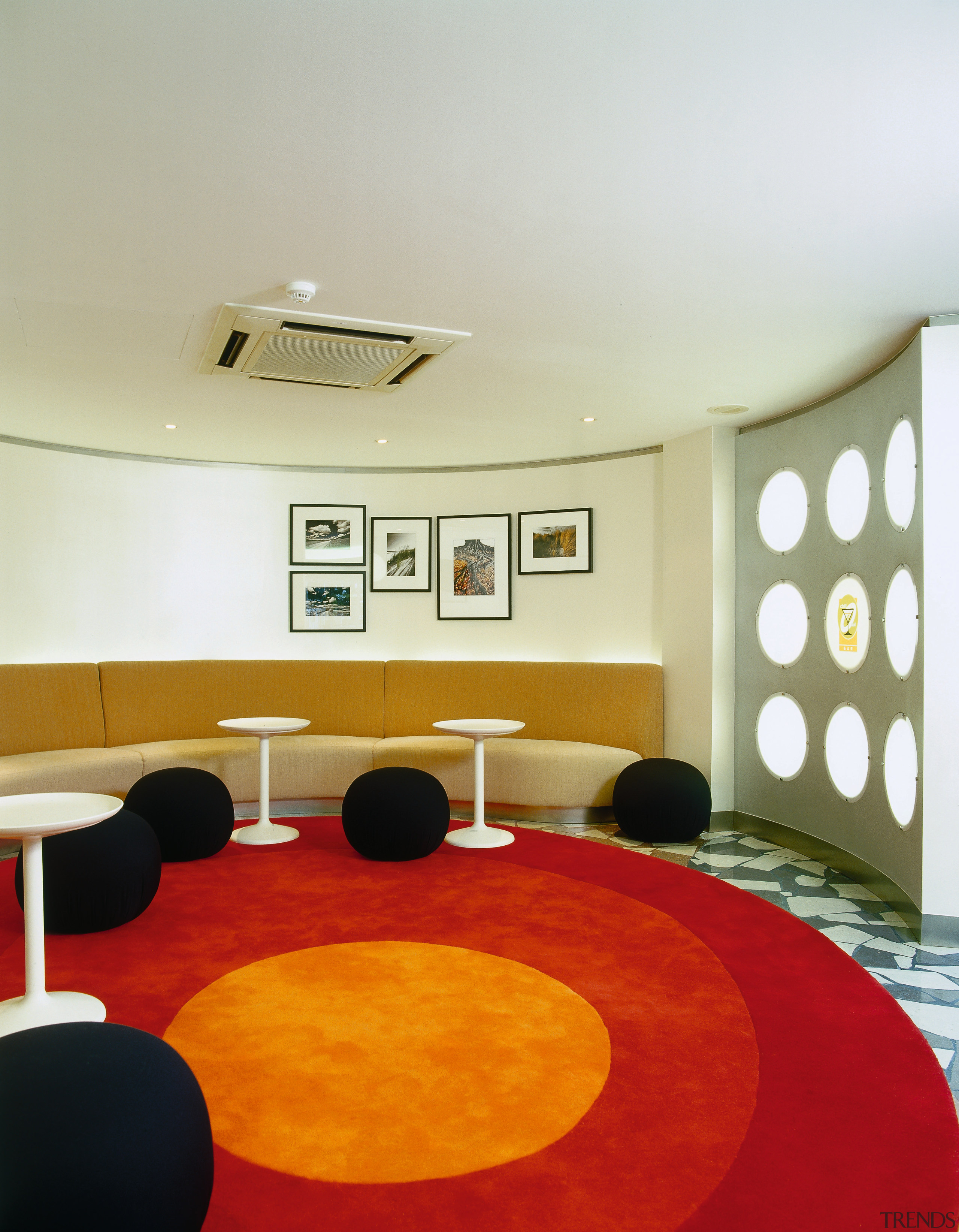 View of the lounge area - View of architecture, ceiling, floor, flooring, interior design, room, table, yellow