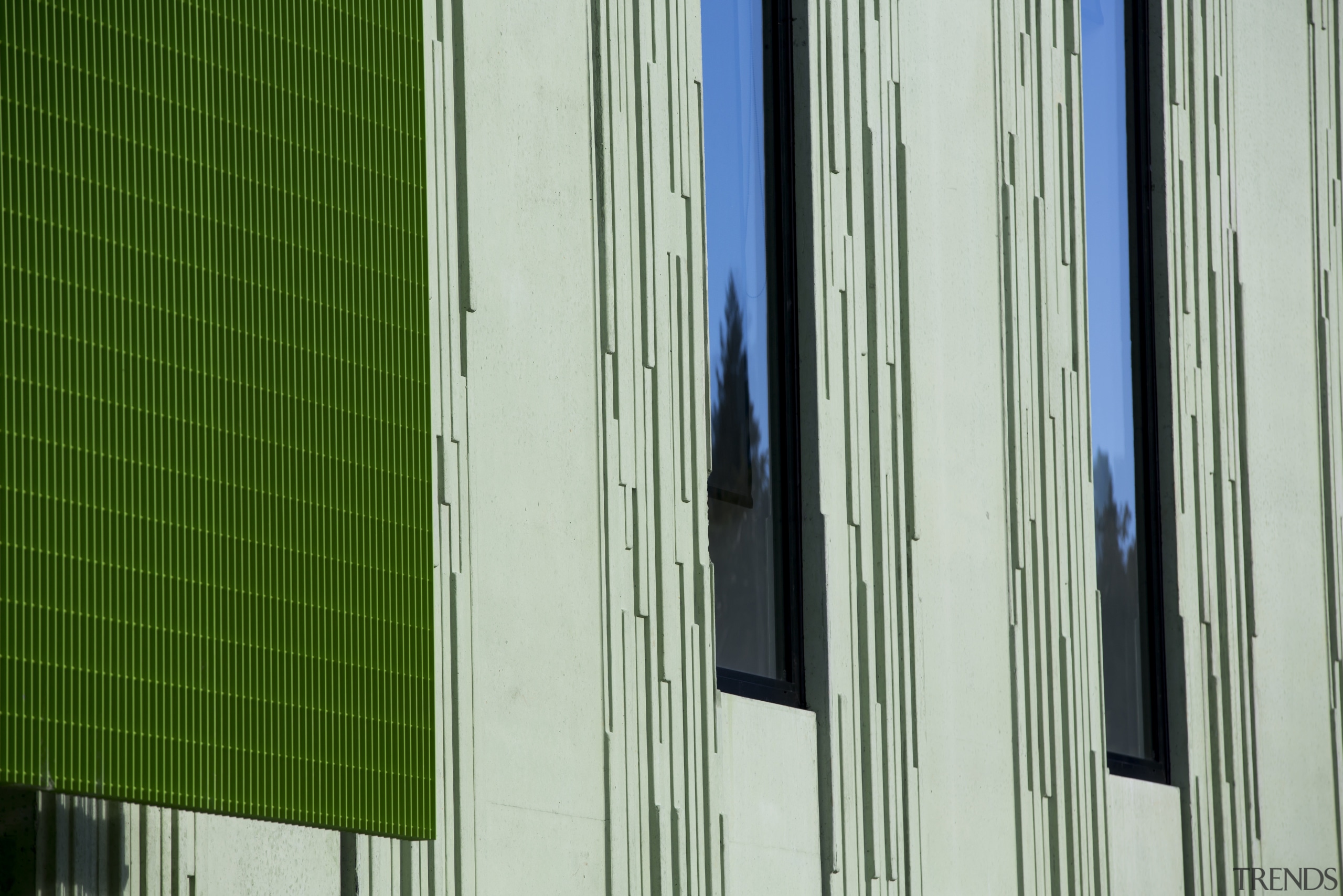 This patterned, green-pigmented concrete cladding on the new architecture, building, daylighting, door, facade, glass, green, house, line, structure, wall, window, window covering, wood, gray, green