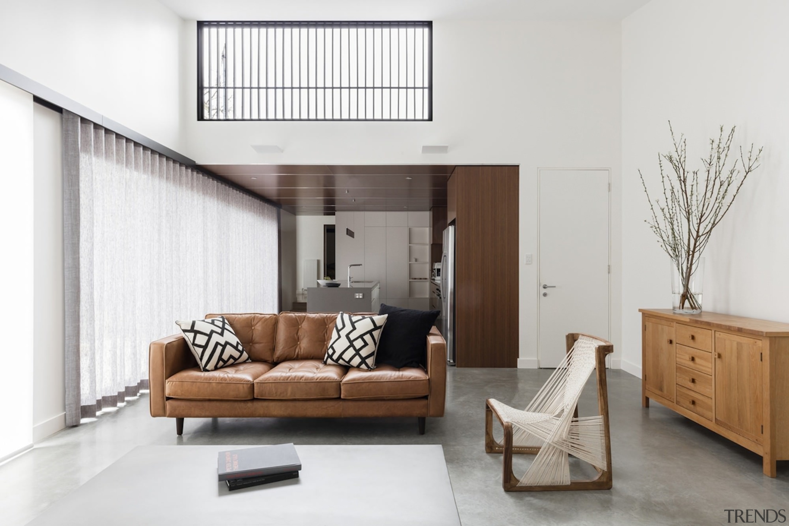 This living area has a high window to floor, furniture, home, interior design, living room, room, white