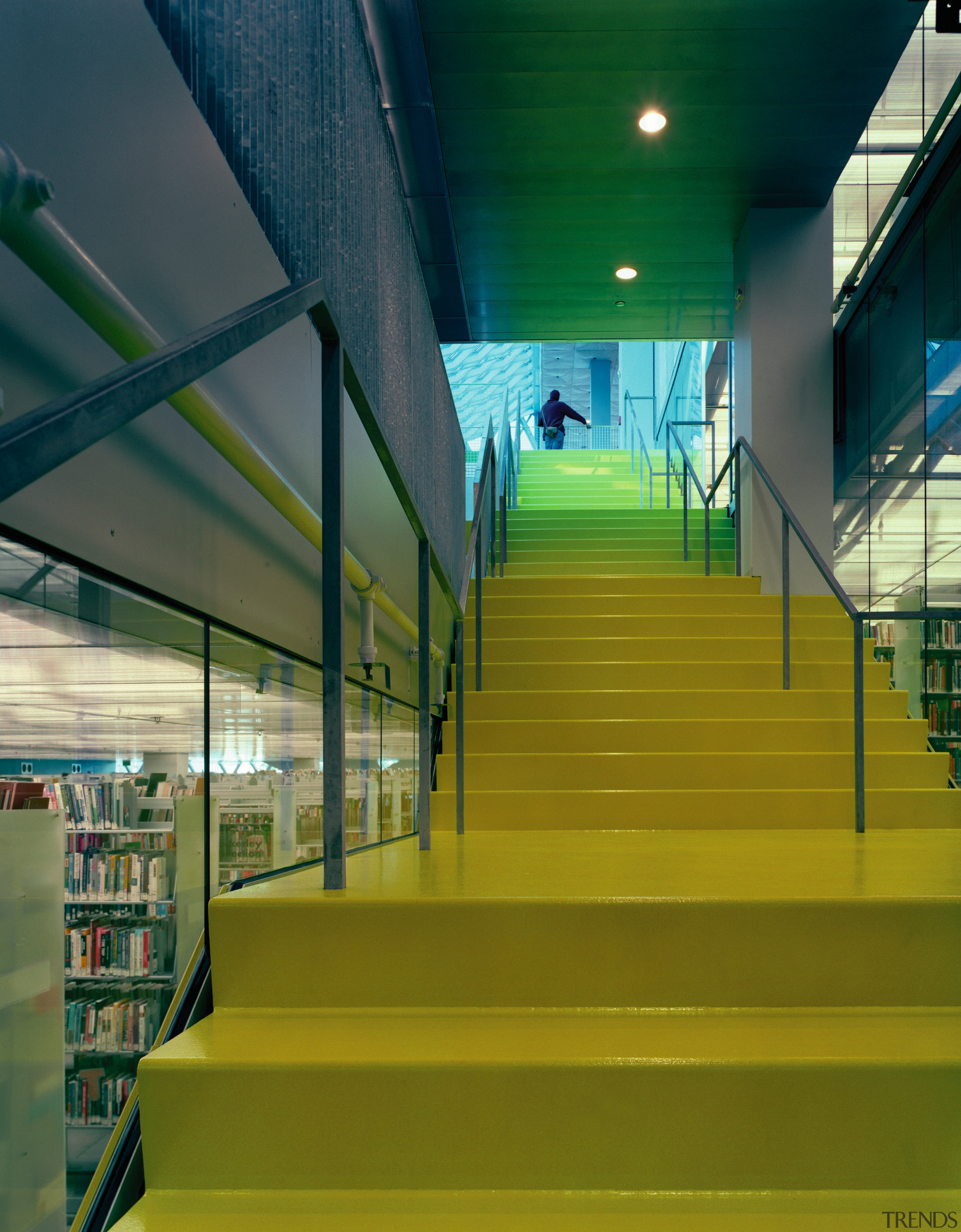 Close up view of a yellow staircase leading architecture, daylighting, green, leisure centre, line, structure, yellow, brown