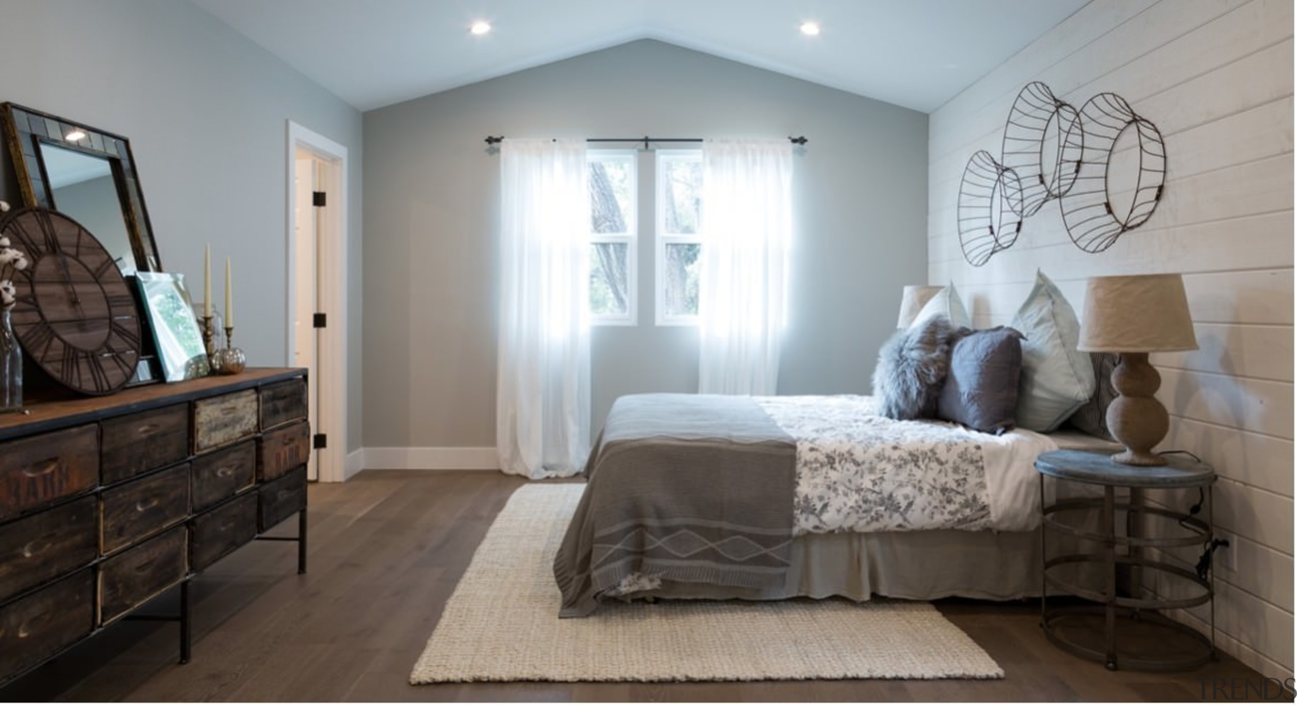 A view of the bedroom from the far bed frame, bedroom, ceiling, floor, flooring, home, interior design, real estate, room, wall, window, wood, gray