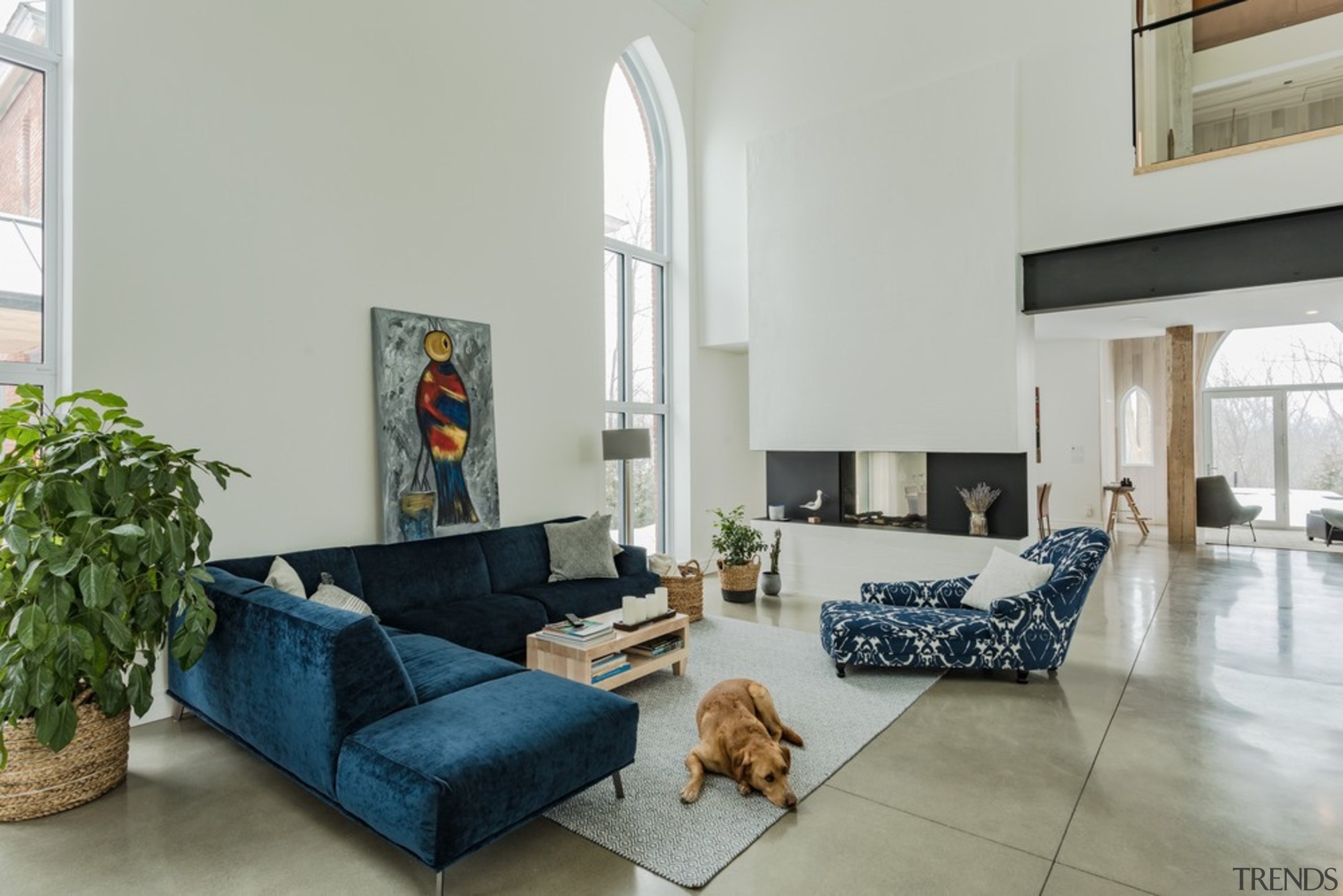 Neogothic architecture with contemporary character architecture, blue, building, ceiling, coffee table, comfort, couch, estate, floor, furniture, home, house, interior design, living room, loft, property, real estate, room, slipcover, sofa bed, table, wall, gray