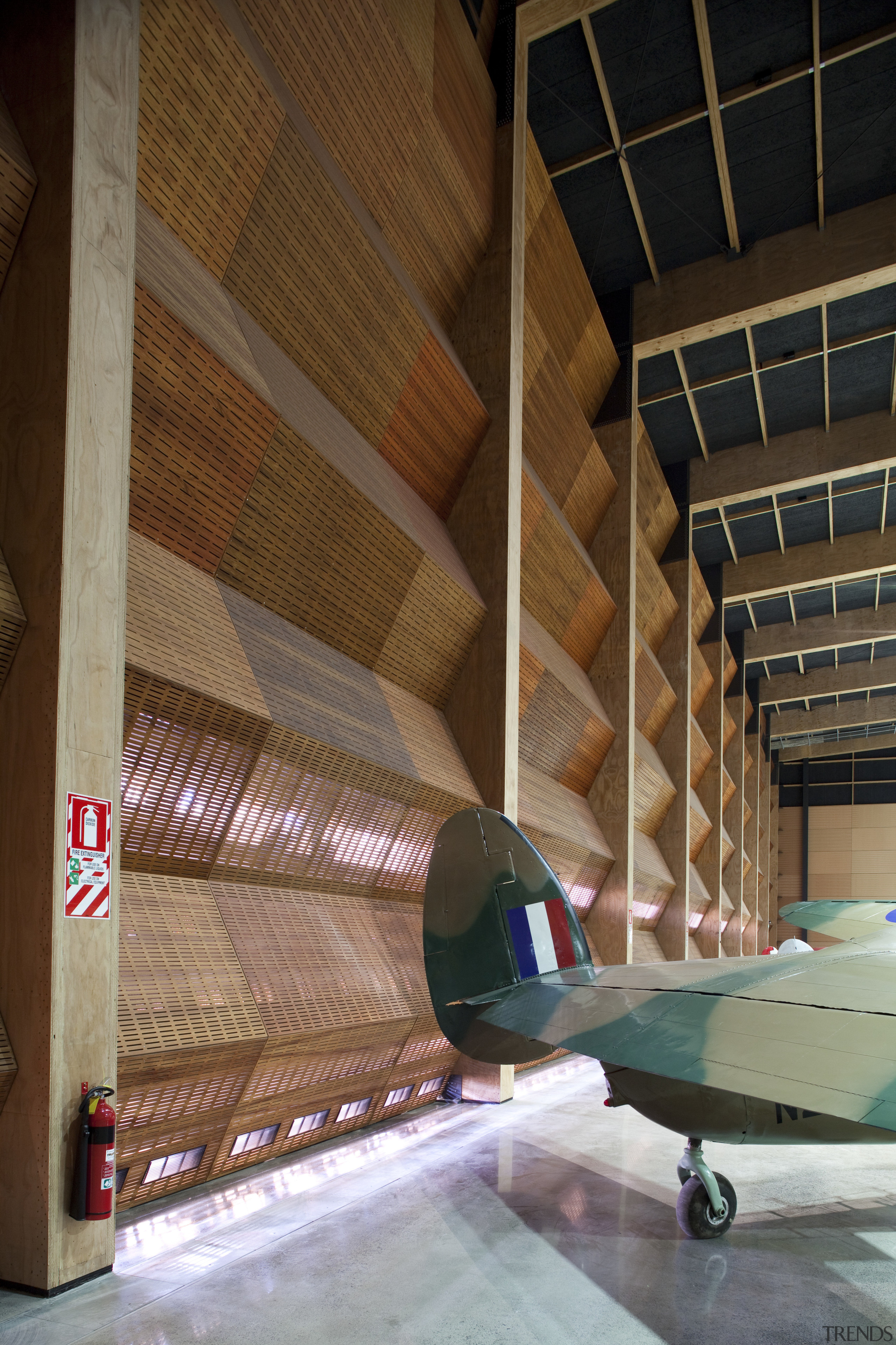 Here is a view of MOTAT's Arviation Display architecture, ceiling, daylighting, floor, structure, wood, brown