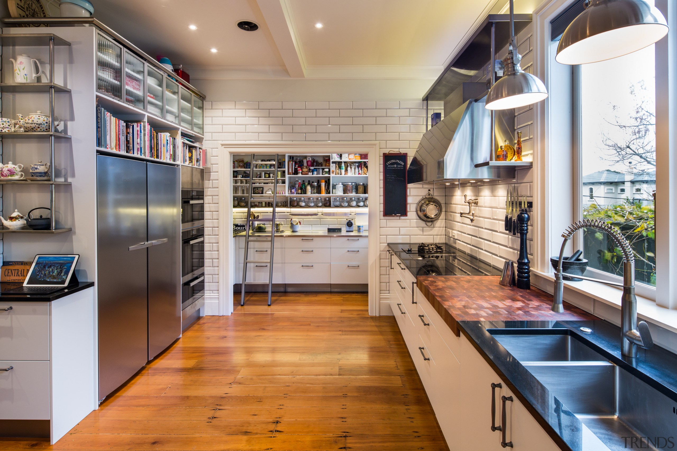 Glass, steel, subway tiles and classic lighting combine countertop, interior design, kitchen, gray