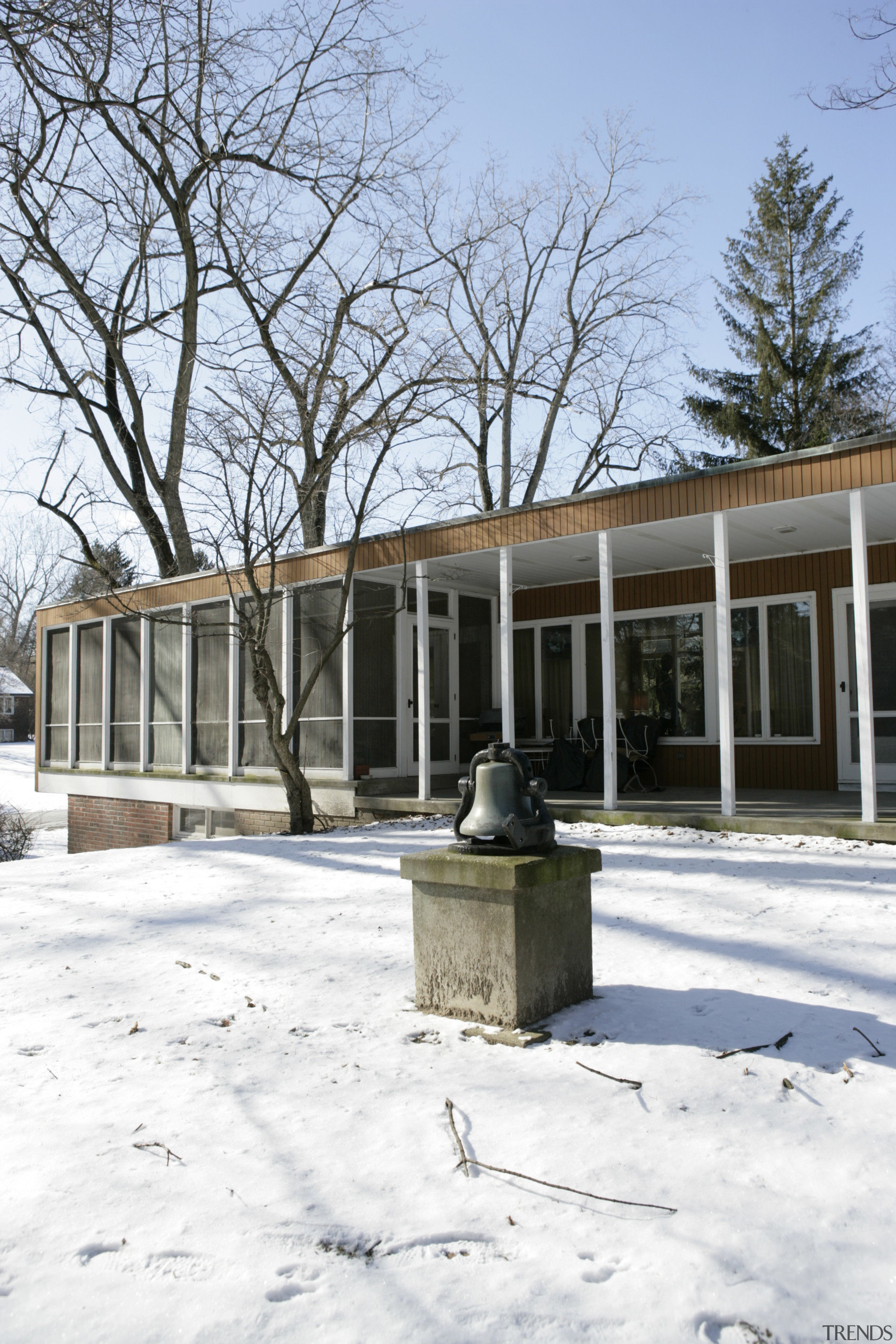 Exterior view of this home before decorating - architecture, building, facade, home, house, snow, tree, window, winter, white, gray
