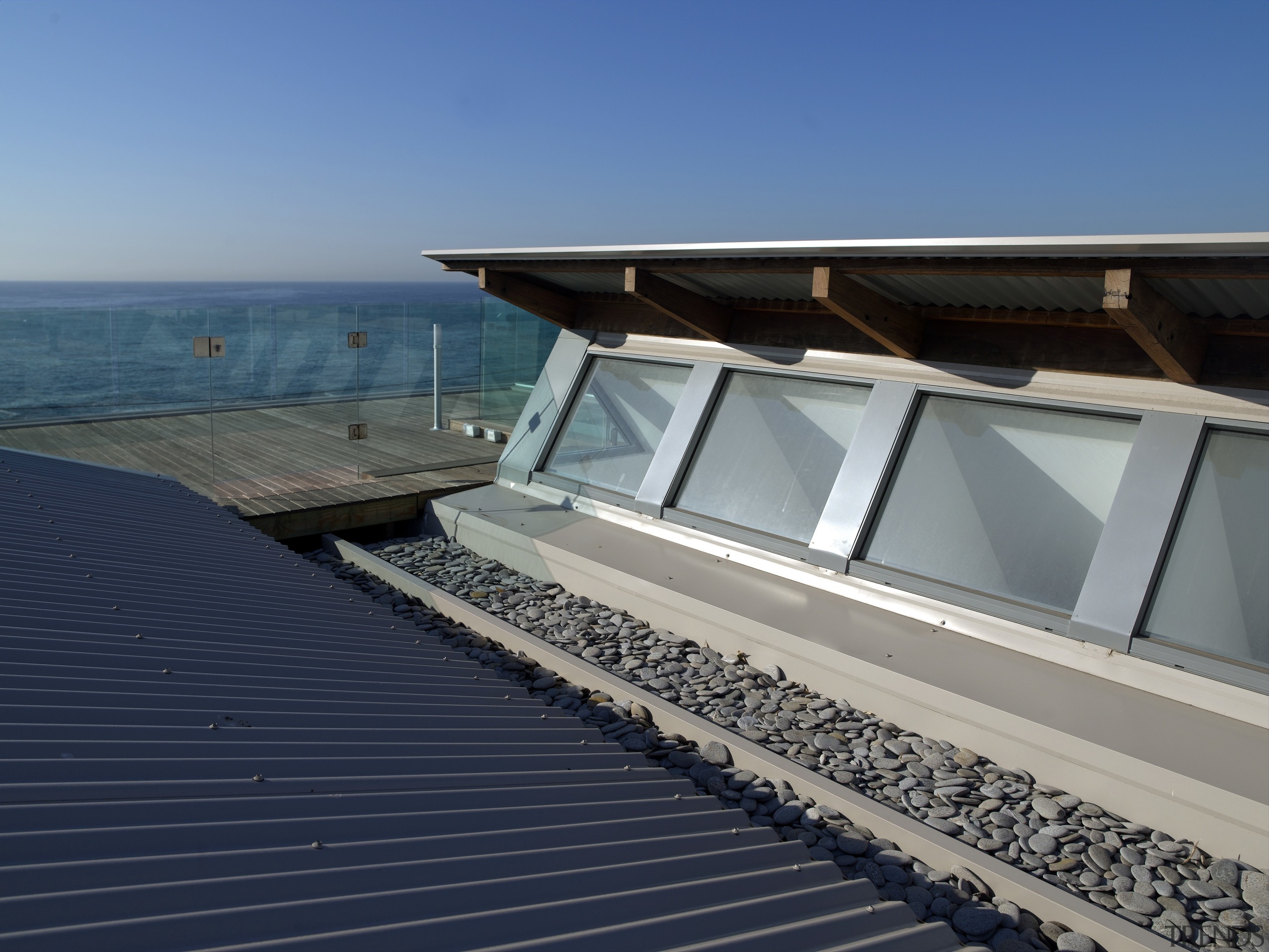 Accessible from a concealed staircase in the living architecture, daylighting, house, roof, sea, sky, water, gray, blue