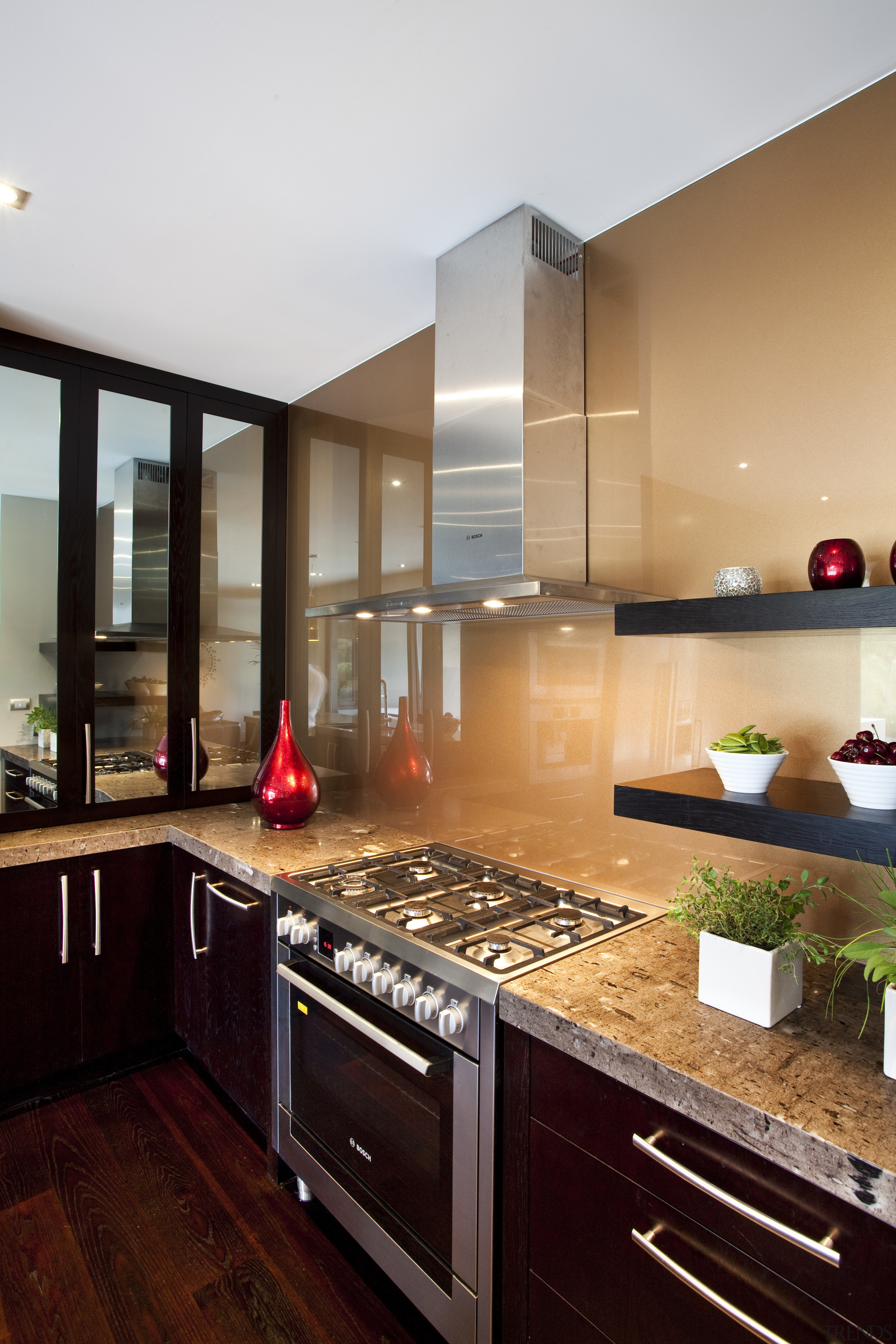 Balinese design influence. Dark-roasted American oak floorboards. Mousse cabinetry, countertop, cuisine classique, interior design, kitchen, room, black, white