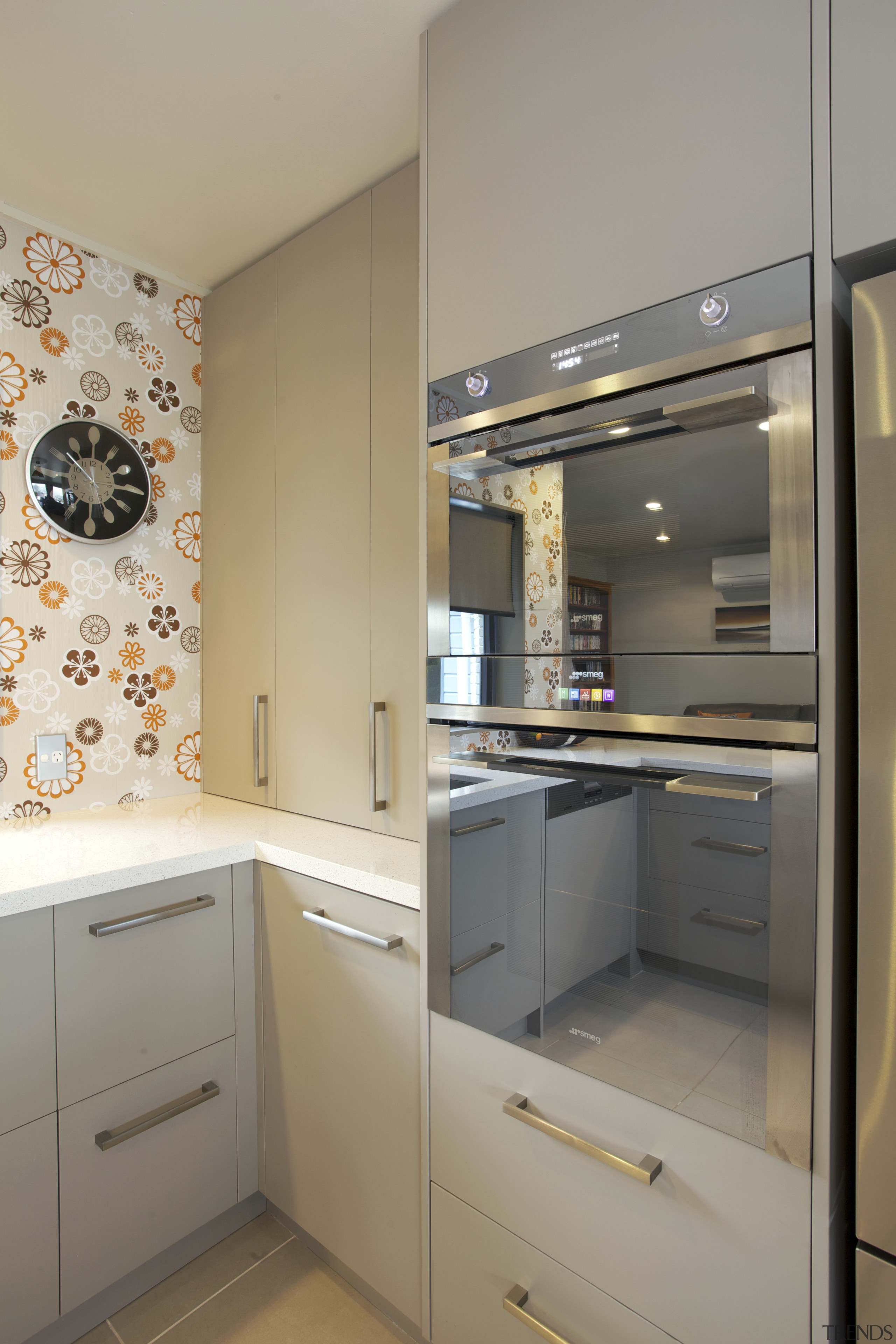 This new kitchen designed by Colleen Holder features cabinetry, countertop, cuisine classique, home appliance, interior design, kitchen, major appliance, room, gray