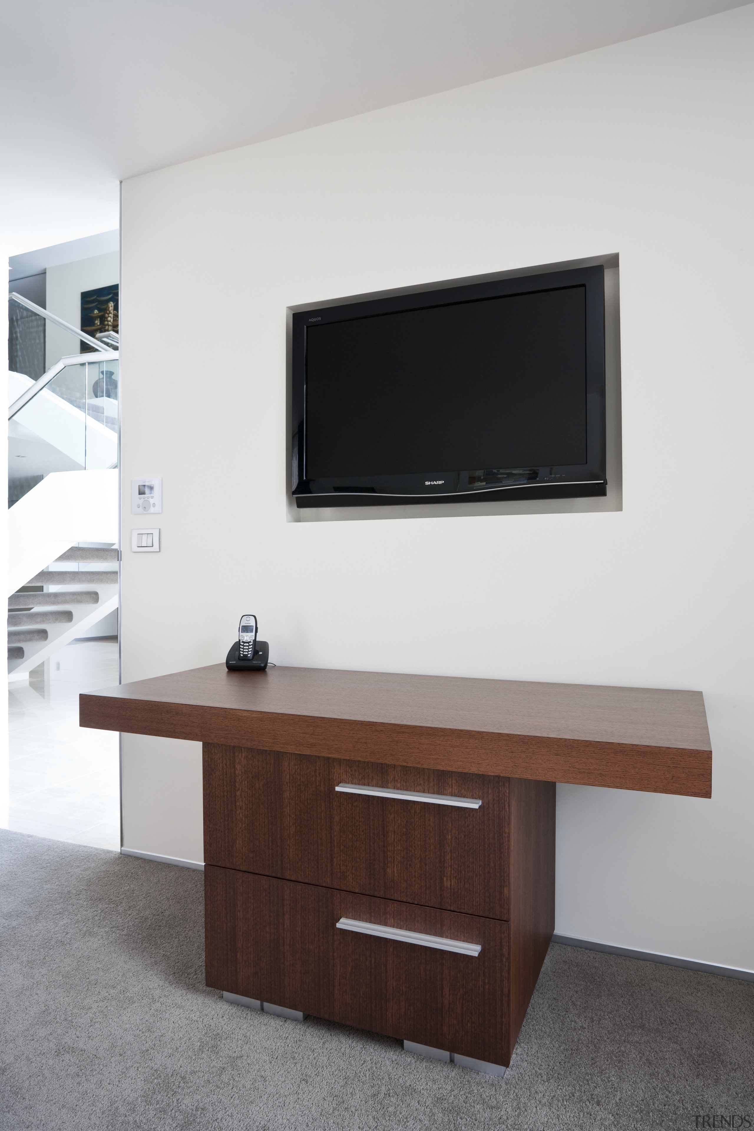 View of home refurbished by interior designer Suzanne display device, furniture, interior design, product design, table, white, gray