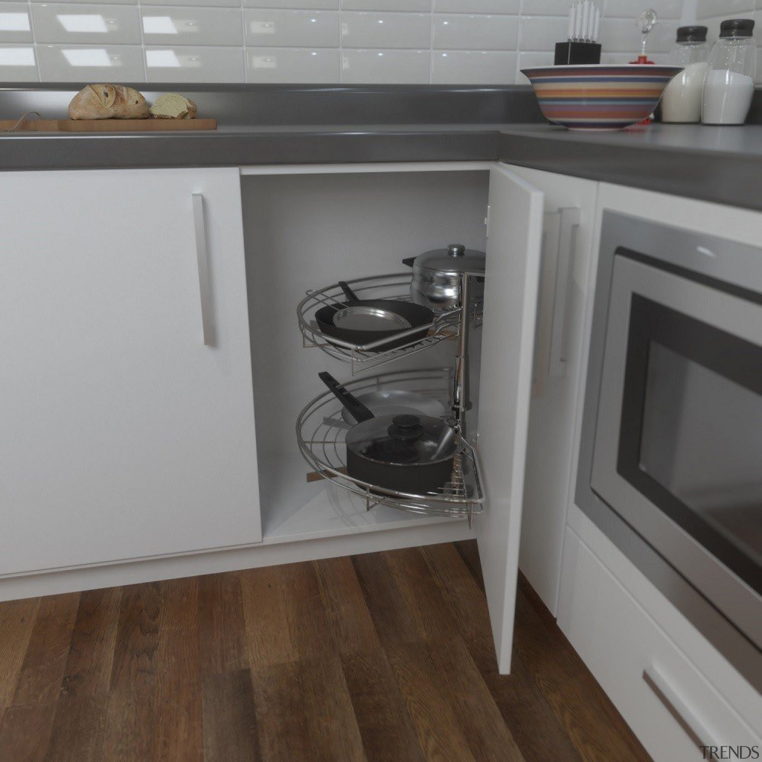 Giamo's 180° unit for blind corners is an cabinetry, countertop, drawer, floor, flooring, furniture, hardwood, home appliance, kitchen, kitchen stove, laminate flooring, room, wood, wood flooring, gray