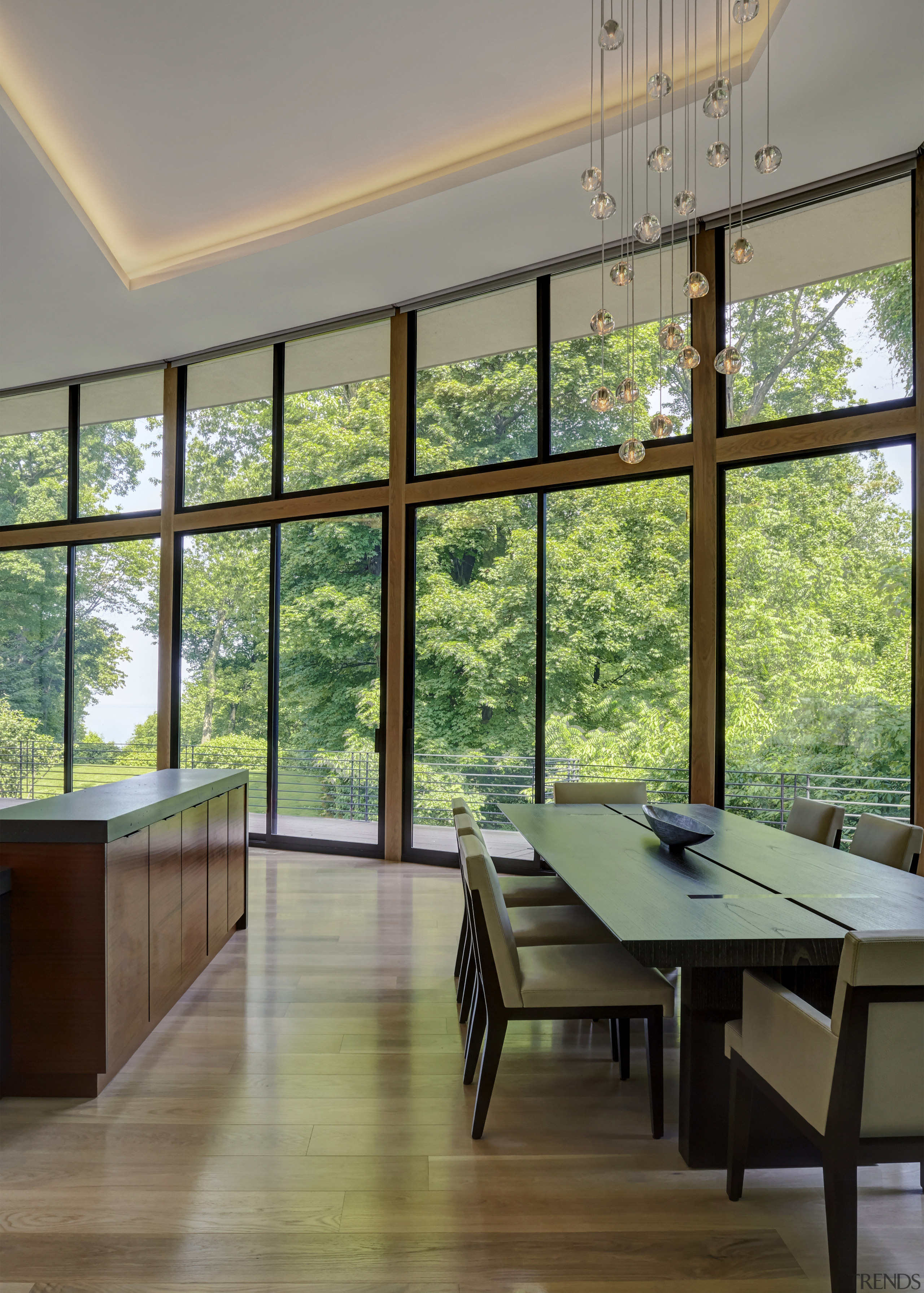 Like the kitchen in this renovated home, the architecture, building, ceiling, daylighting, design, dining room, door, floor, flooring, furniture, glass, hardwood, home, house, interior design, living room, property, real estate, room, sash window, shade, table, tree, window, wood, wood flooring, gray