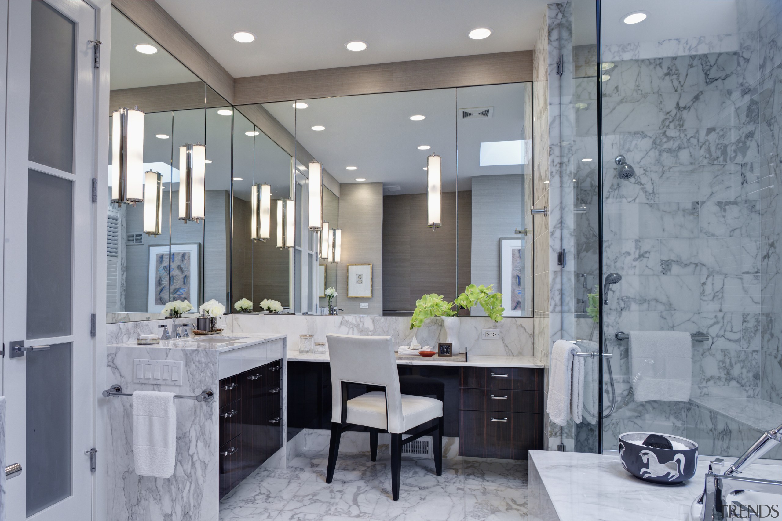 Mirrors wrap around two walls of this remodeled bathroom, ceiling, home, interior design, room, gray