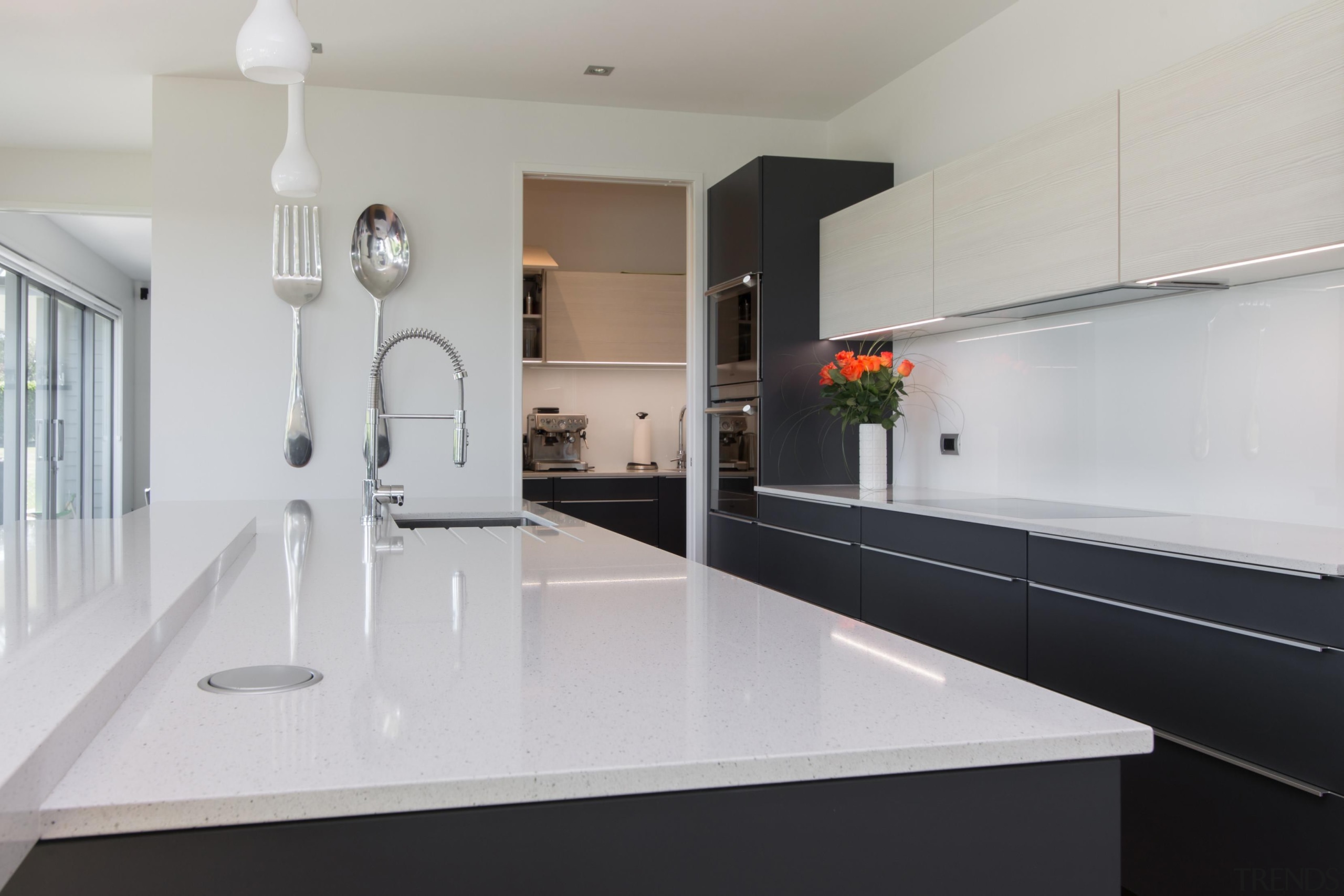 Kitchen cabinetry continues through to the scullery off architecture, countertop, floor, interior design, kitchen, property, real estate, room, gray